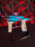 Used Planet Eclipse LV1.6 Paintball Gun - Teal / Pink w/White Grip Kit