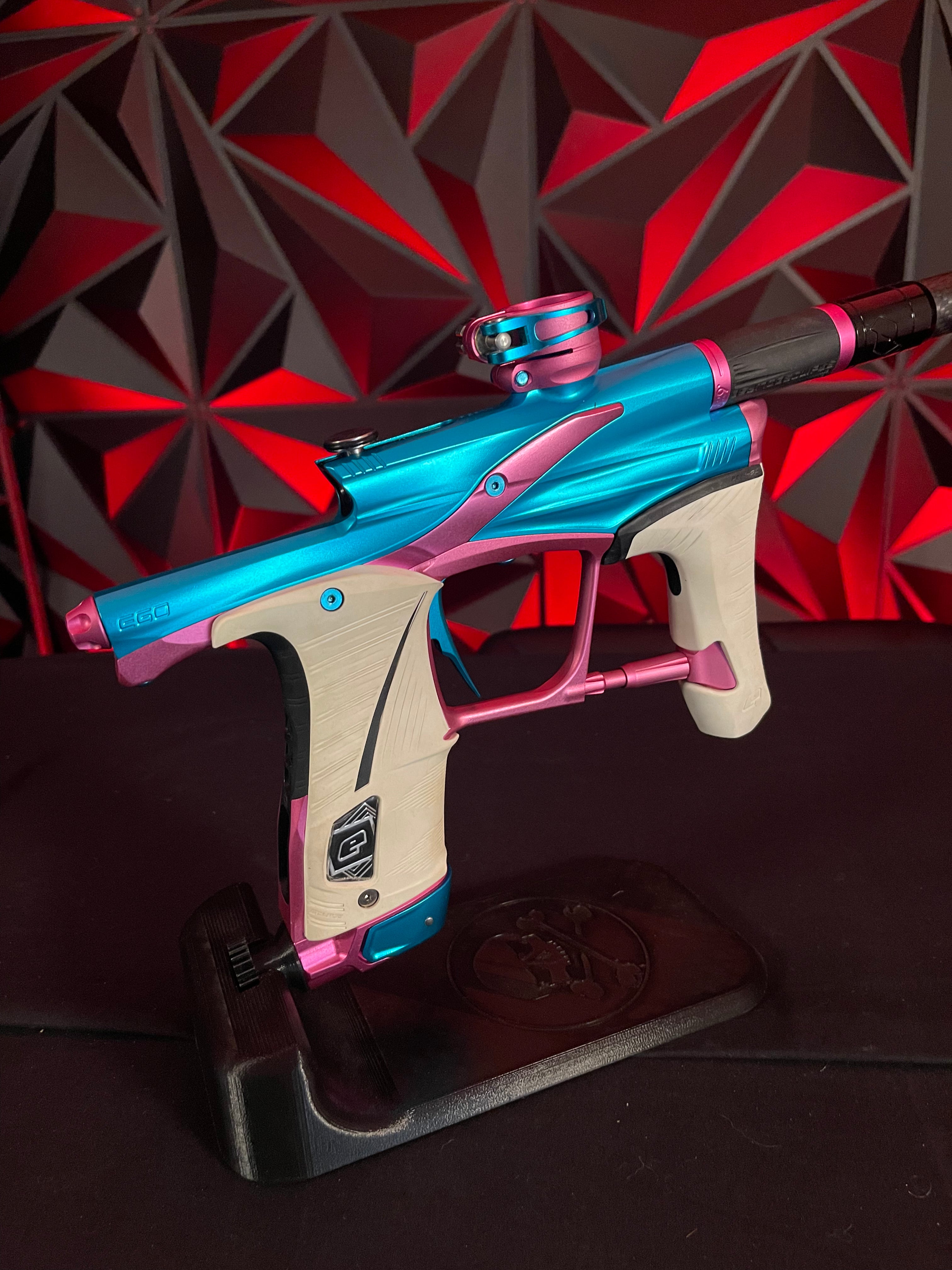 Used Planet Eclipse LV1.6 Paintball Gun - Teal / Pink w/White Grip Kit