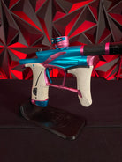 Used Planet Eclipse LV1.6 Paintball Gun - Teal / Pink w/White Grip Kit