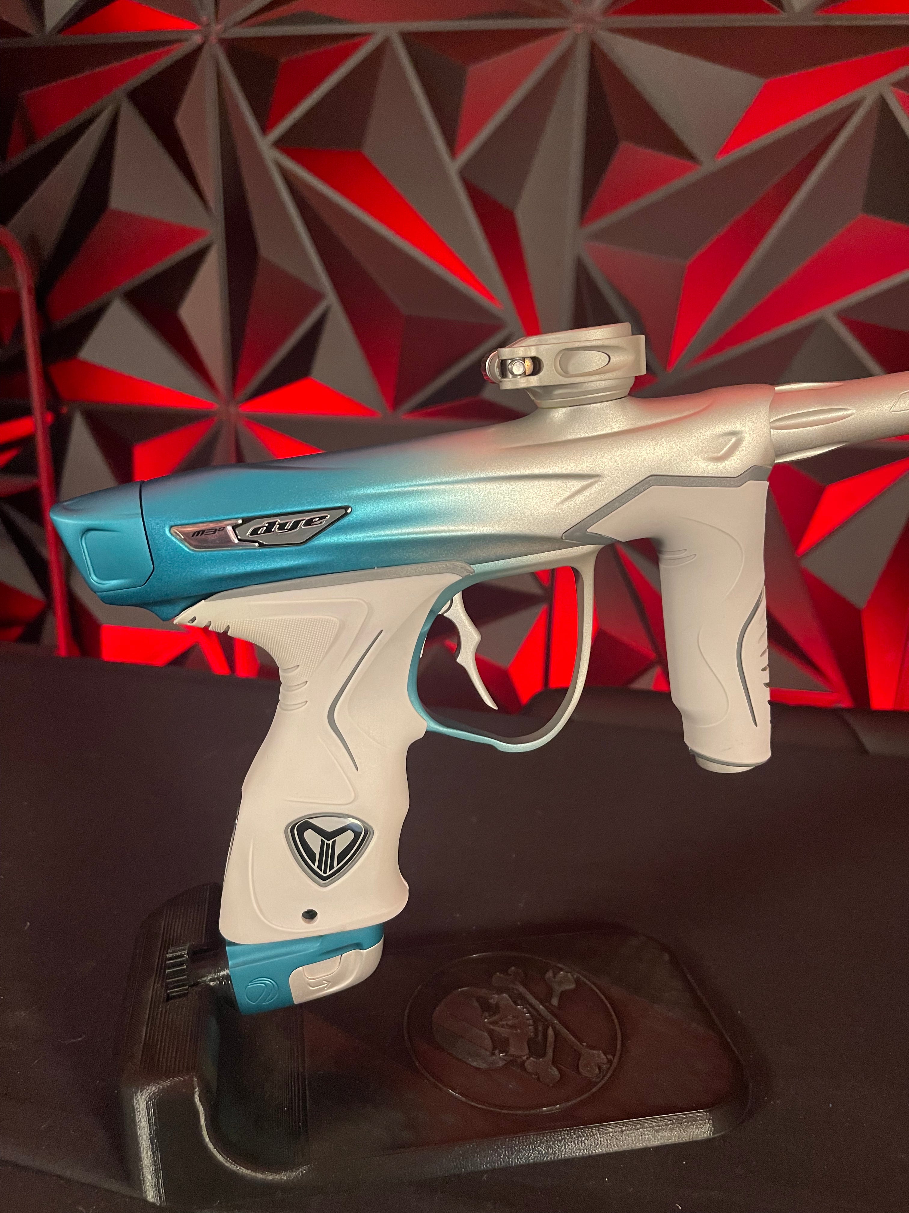 Used Dye M3+ Paintball Gun - Custom Blue to Silver Fade w/ Wireless Charging Pad