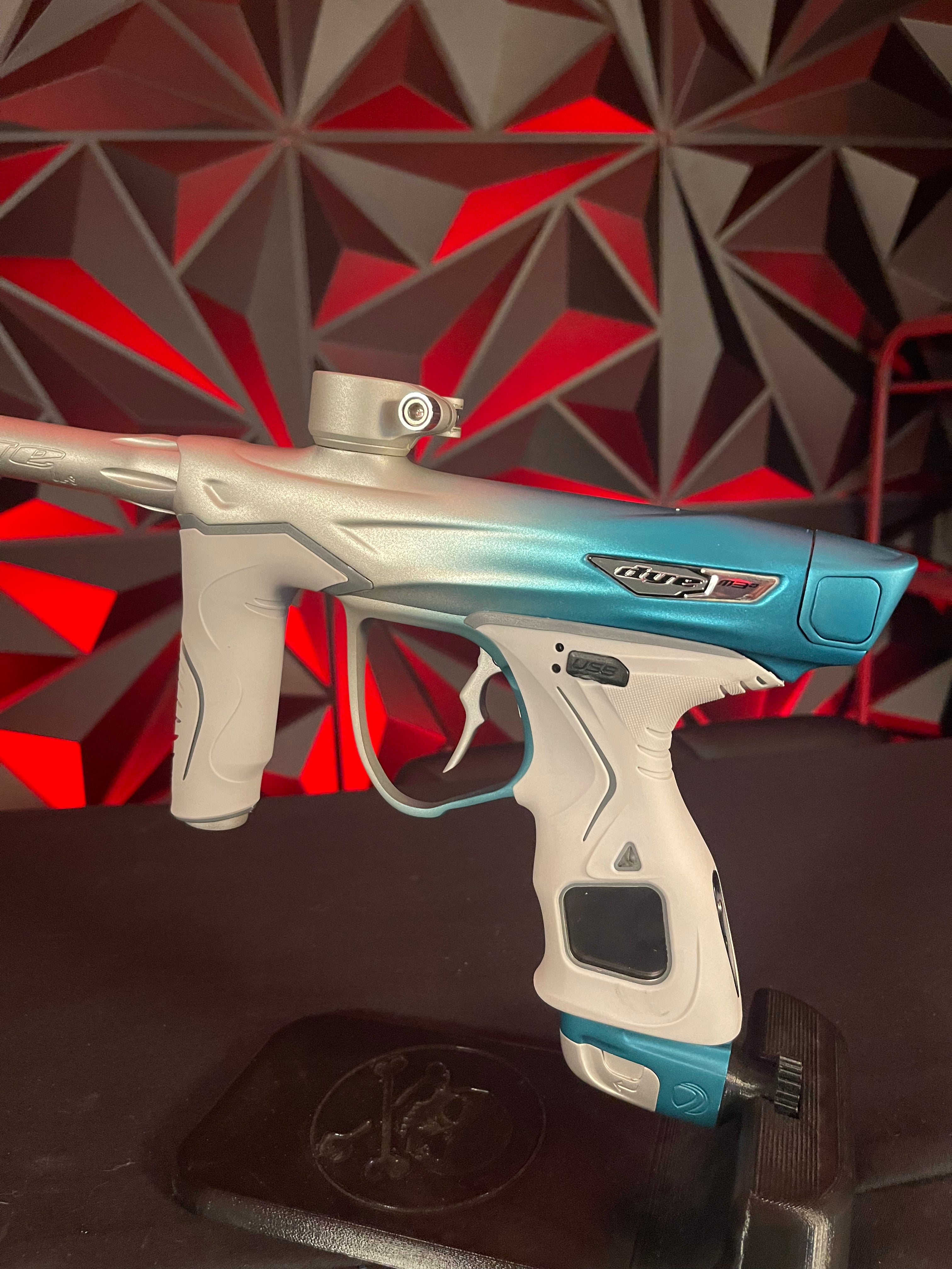 Used Dye M3+ Paintball Gun - Custom Blue to Silver Fade w/ Wireless Charging Pad