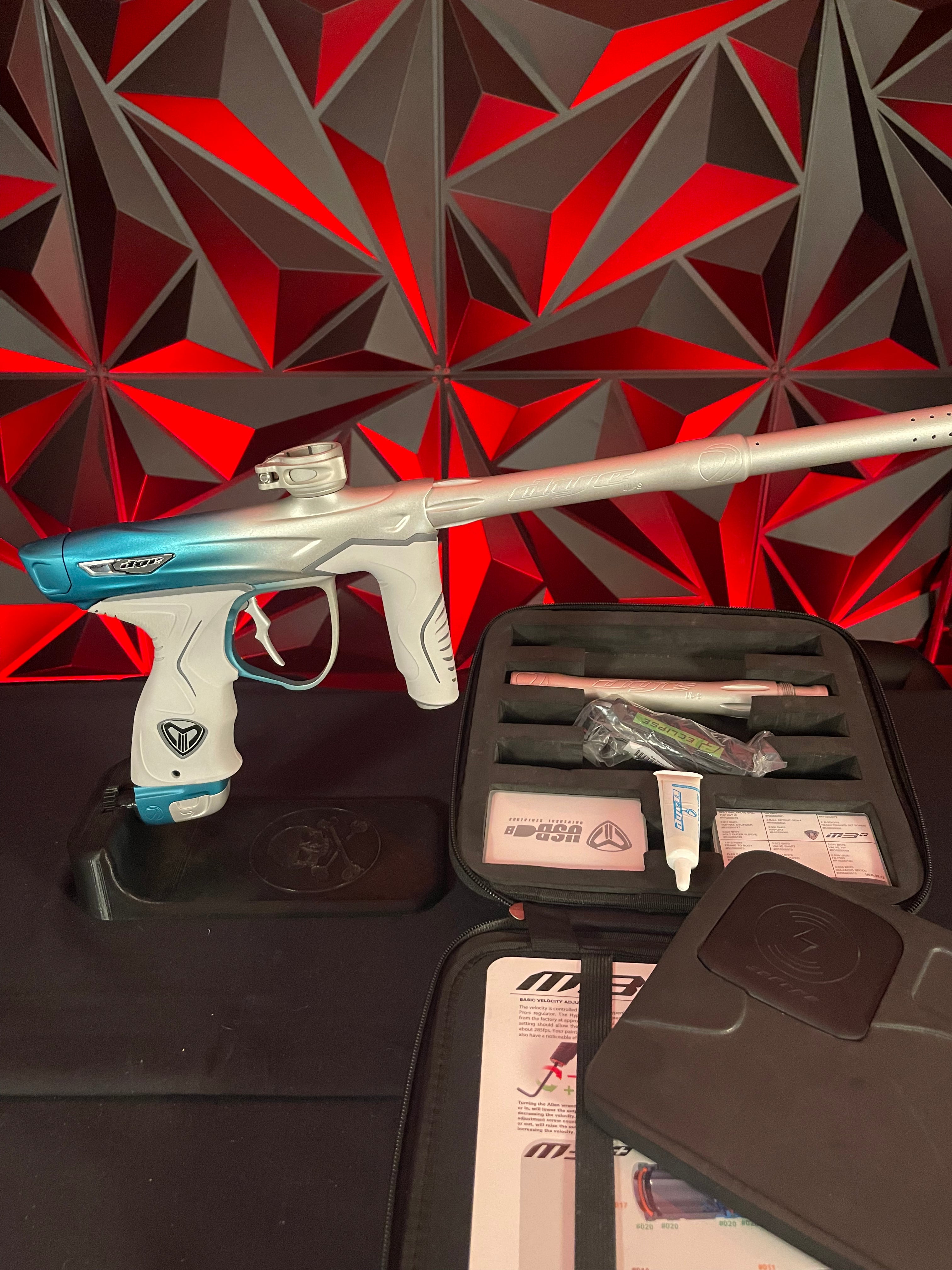 Used Dye M3+ Paintball Gun - Custom Blue to Silver Fade w/ Wireless Charging Pad