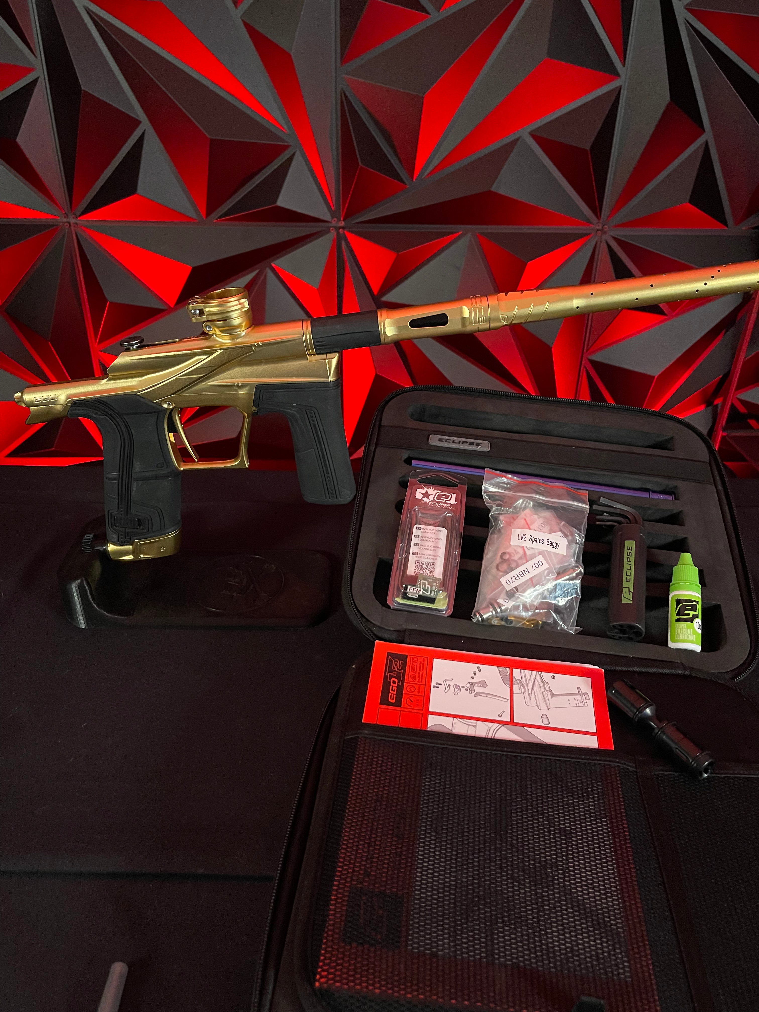 Used Planet Eclipse LV2 Paintball Gun - Gold/Gold w/Infamous Deuce Trigger, Bluetooth Module, Extra Bolt