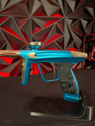 Used DLX Luxe X Paintball Gun - Dust Teal / Polished Gold