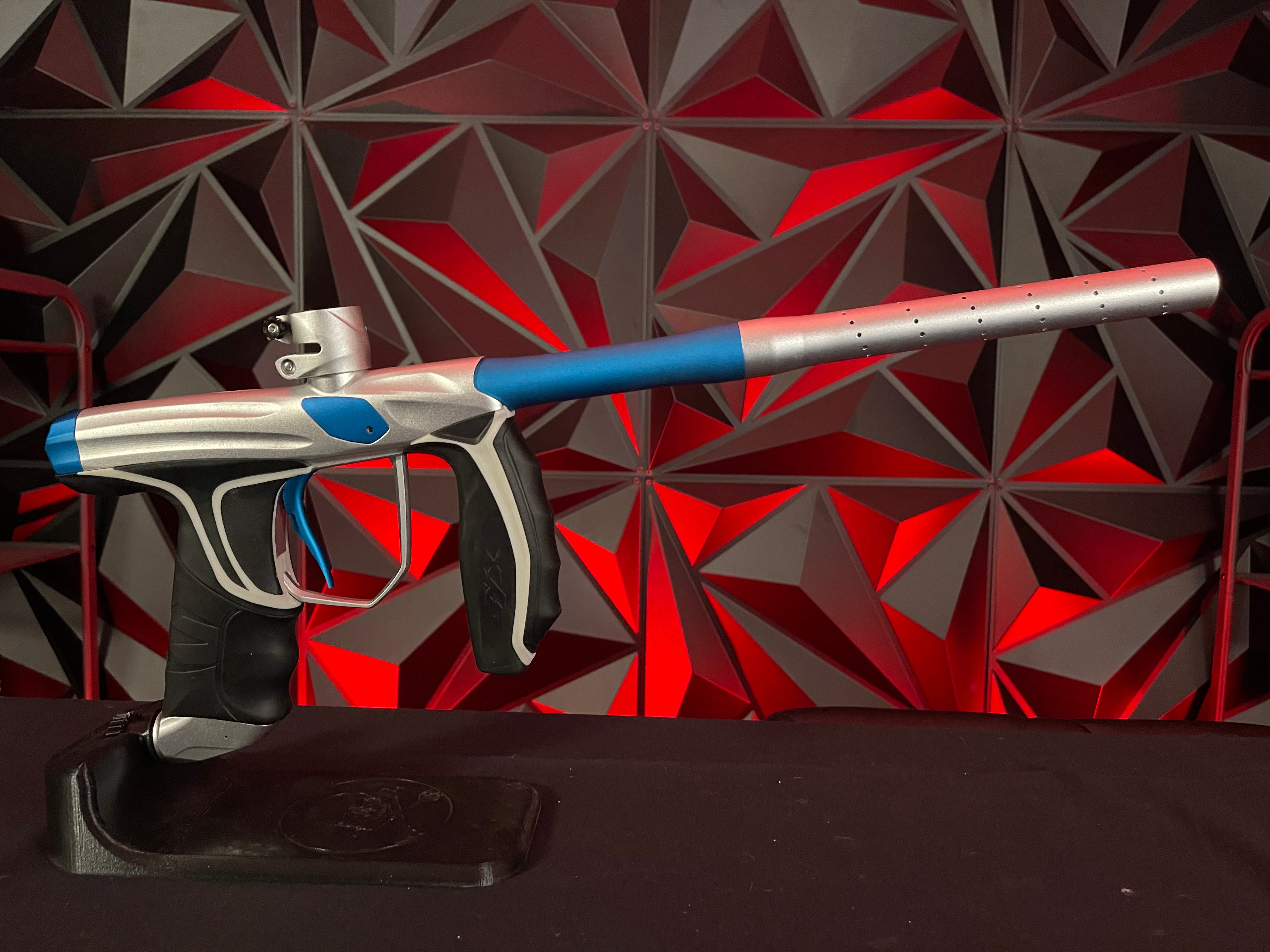 Used Empire SYX Paintball Marker - Silver/Blue w/Full Barrel Kit