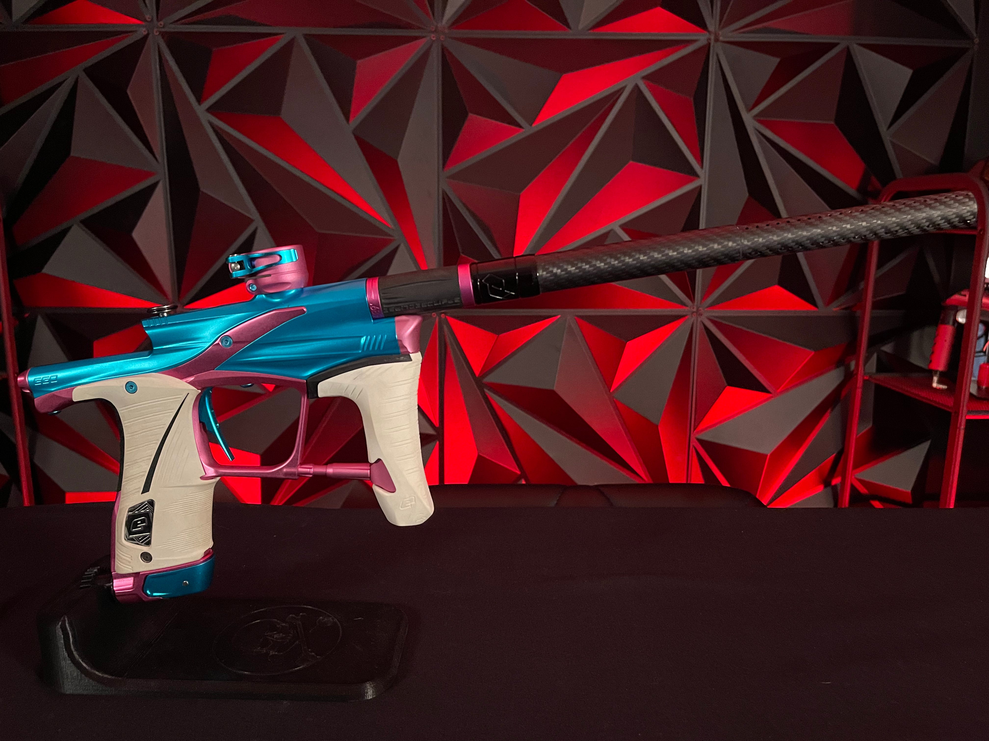 Used Planet Eclipse LV1.6 Paintball Gun - Teal / Pink w/White Grip Kit