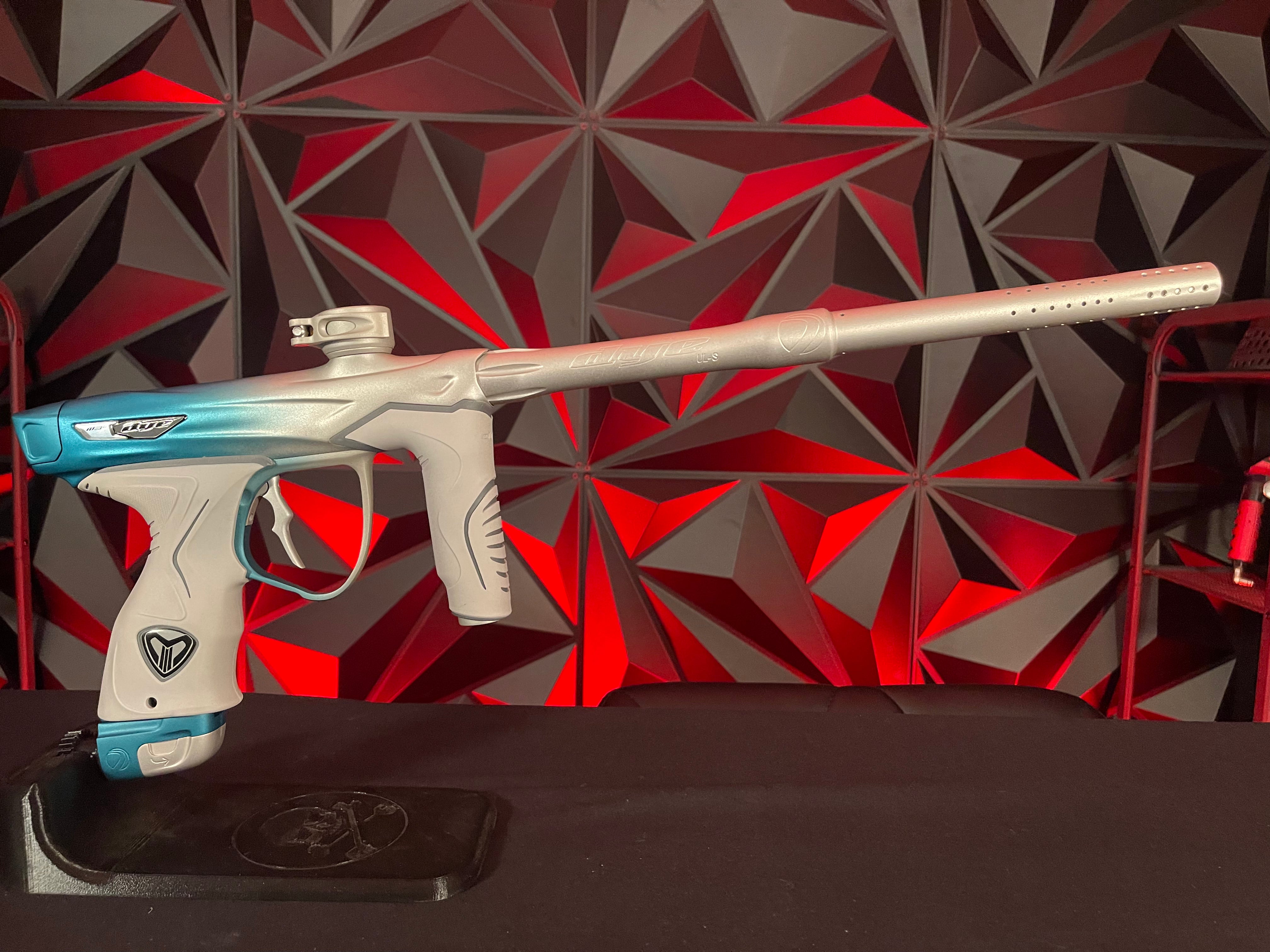 Used Dye M3+ Paintball Gun - Custom Blue to Silver Fade w/ Wireless Charging Pad