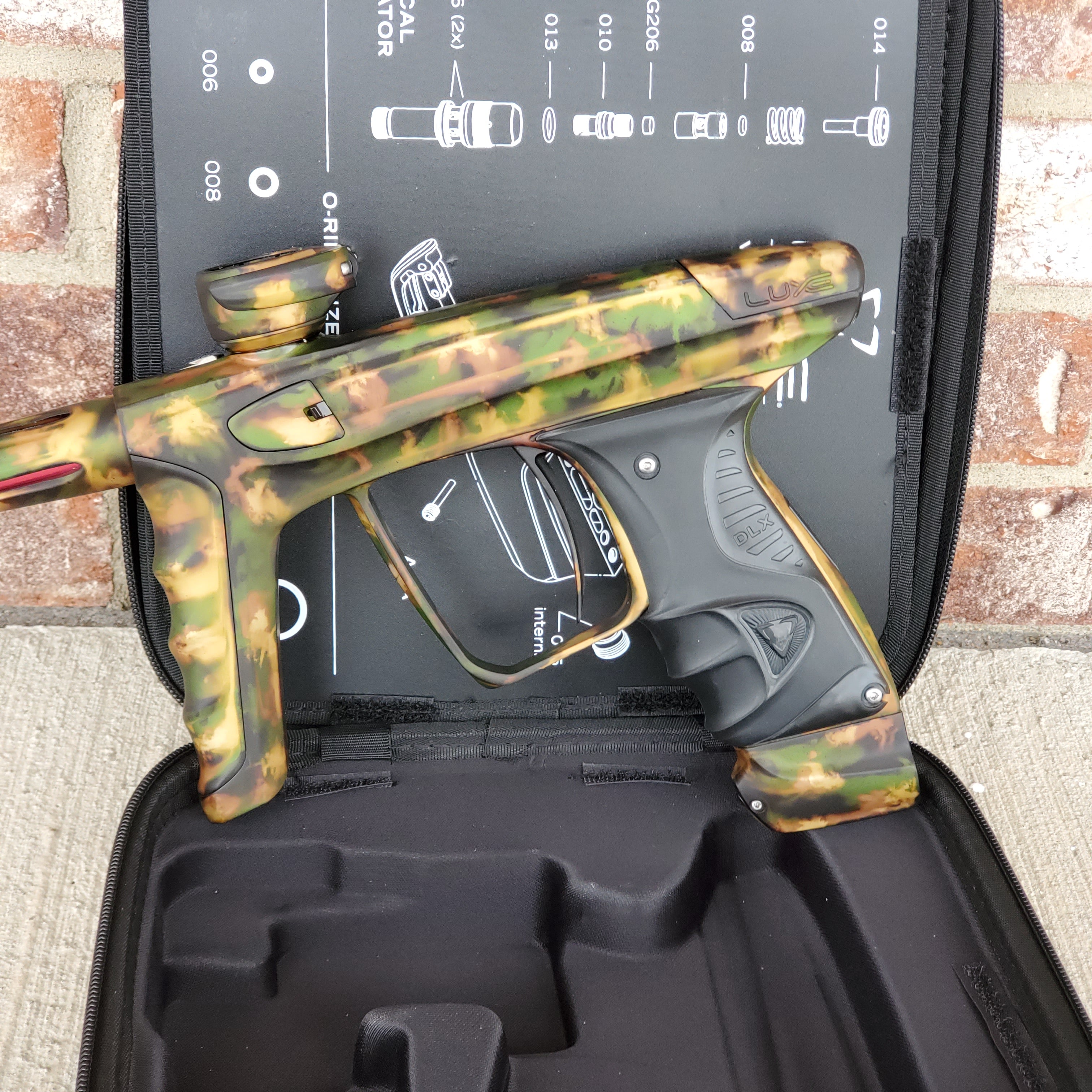 Used DLX Luxe X Paintball Gun - Acid Wash Forest Camo