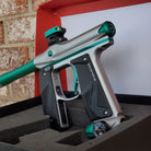 Used Empire Mini GS Paintball Gun- Silver / Aquamarine