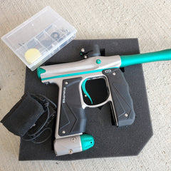 Used Empire Mini GS Paintball Gun- Silver / Aquamarine