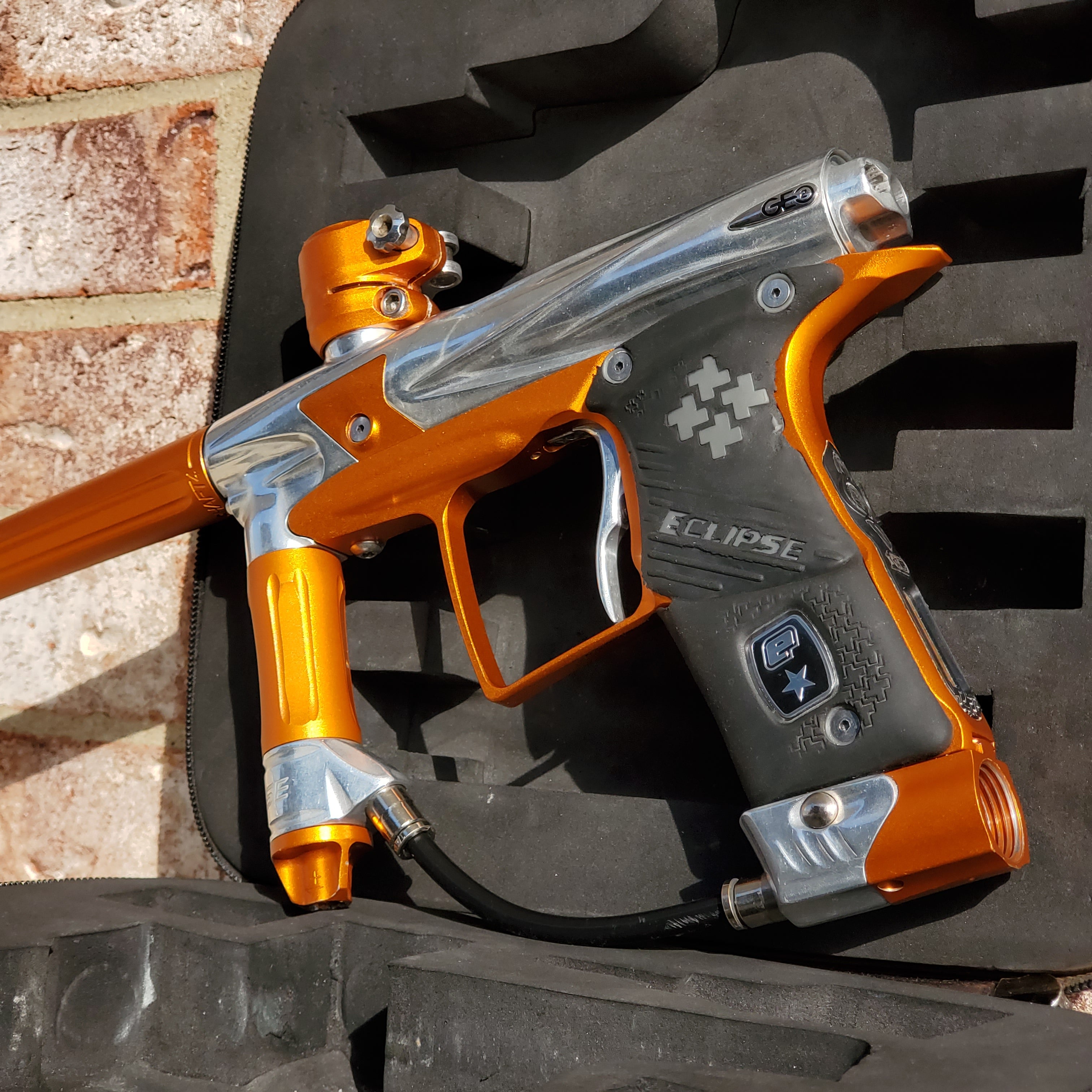 Used Planet Eclipse Geo 2.1 Paintball Gun - Chrome / Orange