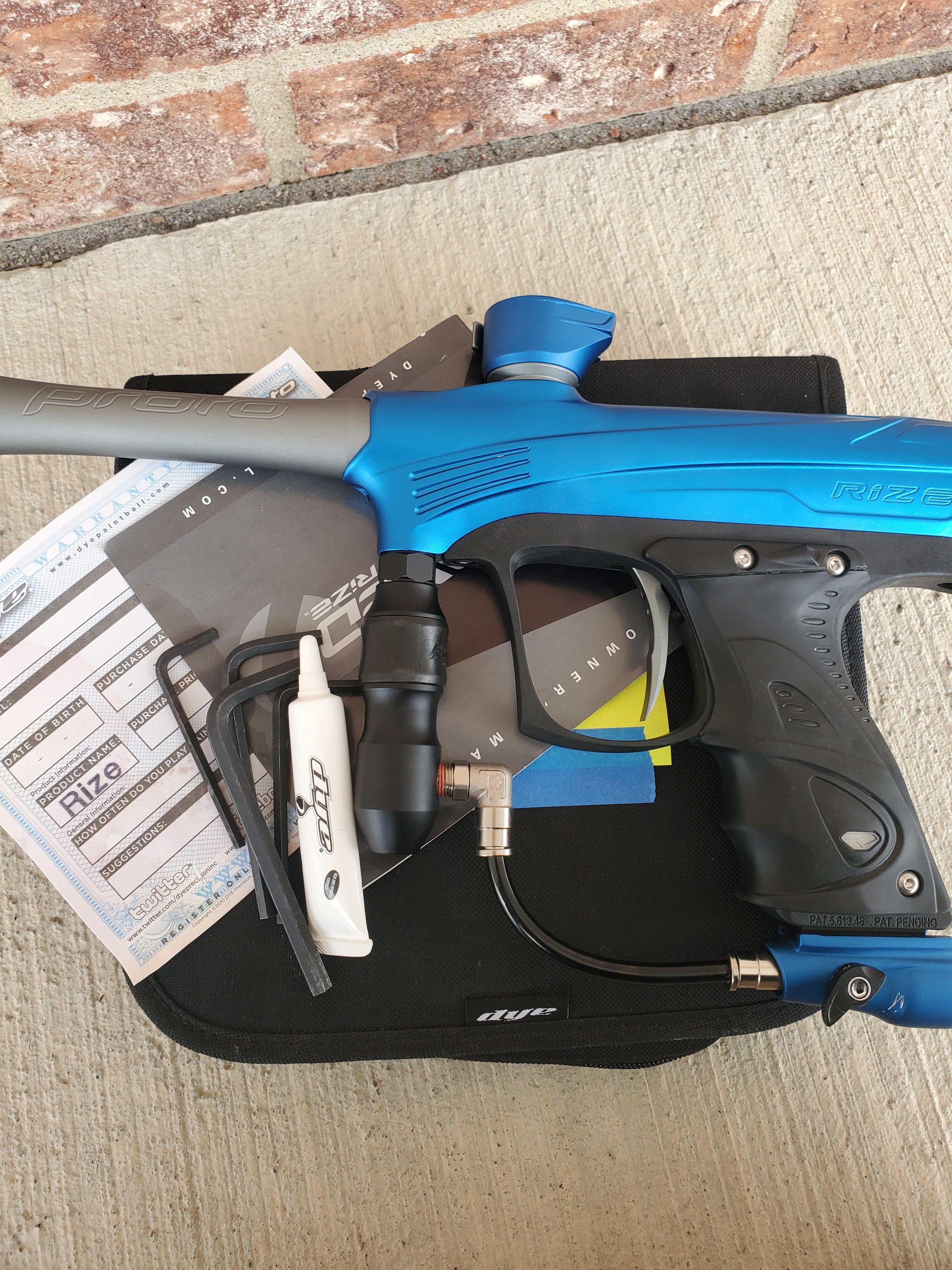 Used Dye Rize Maxxed Paintball Gun - Blue / Grey