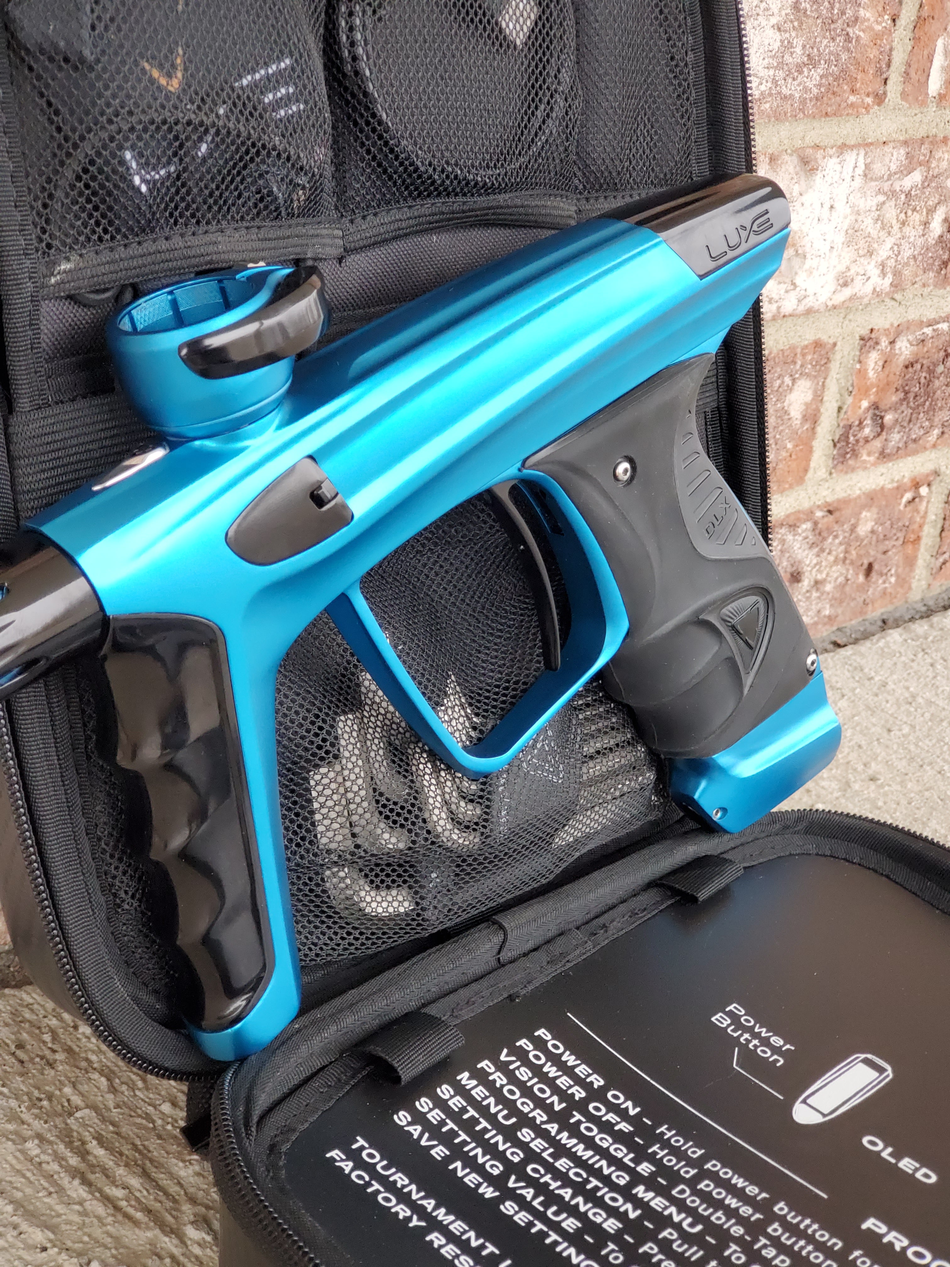 Used DLX Luxe X Paintball Gun - Teal / Black