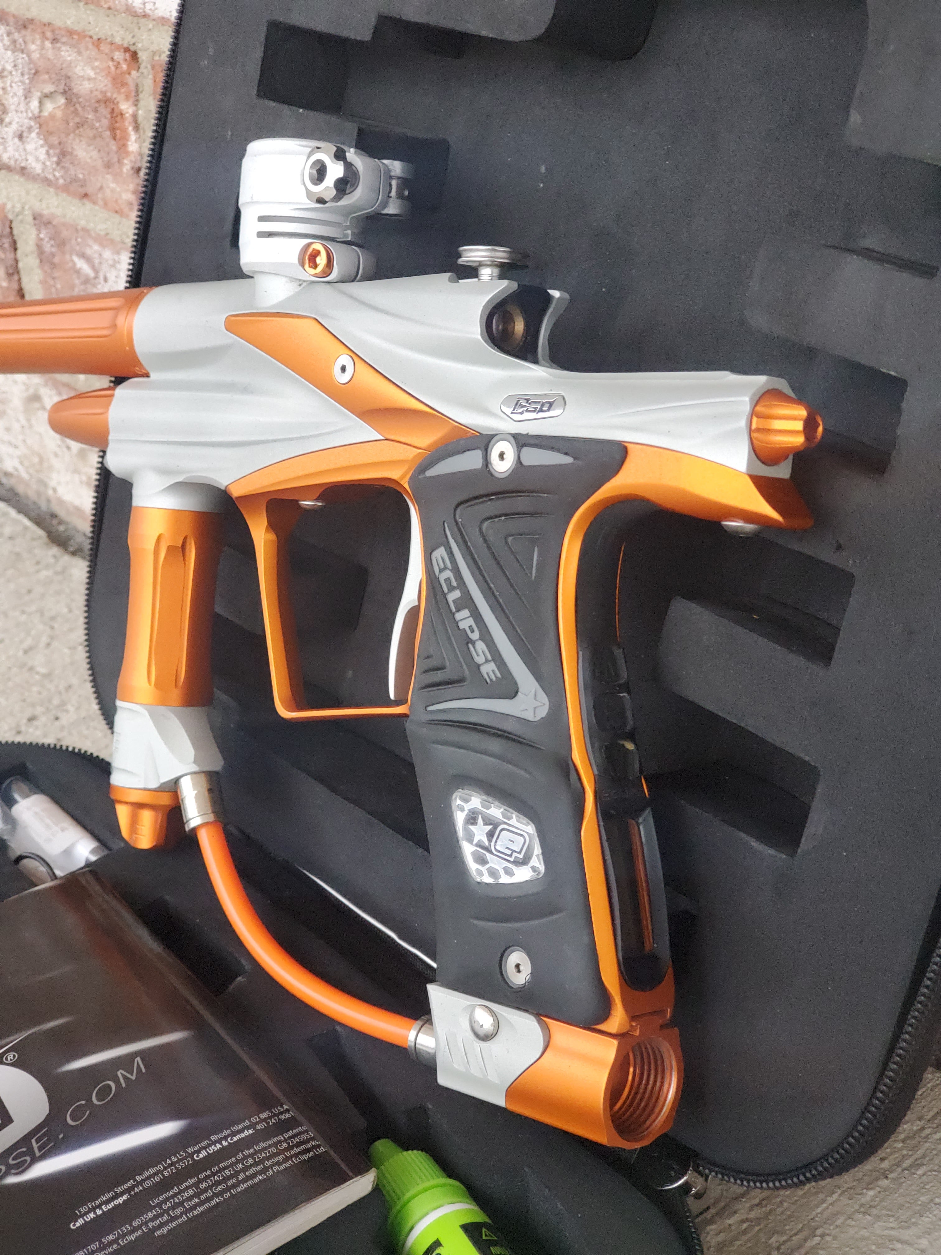 Used Planet Eclipse Ego 11 Paintball Marker- Dust White / Orange