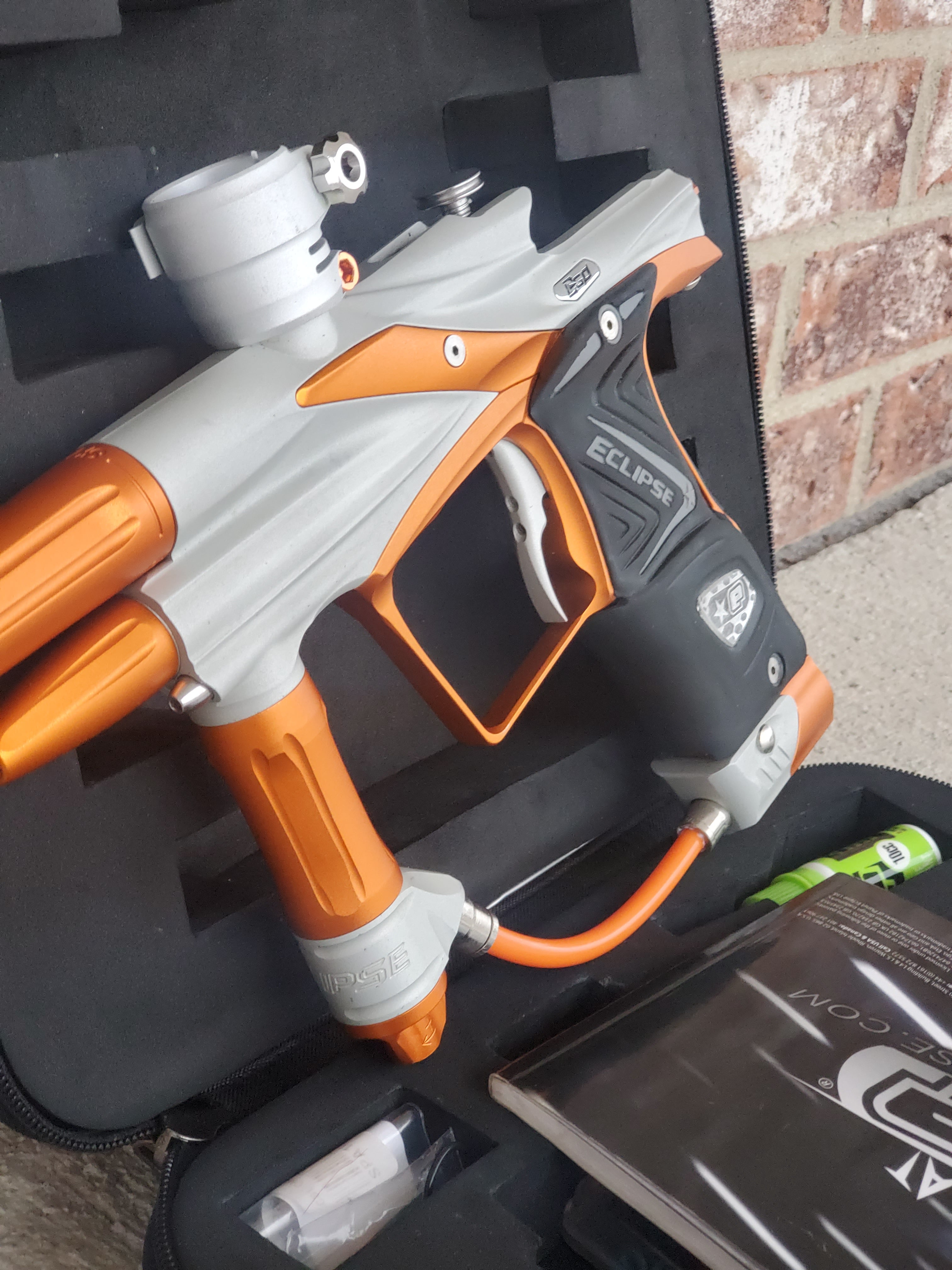 Used Planet Eclipse Ego 11 Paintball Marker- Dust White / Orange