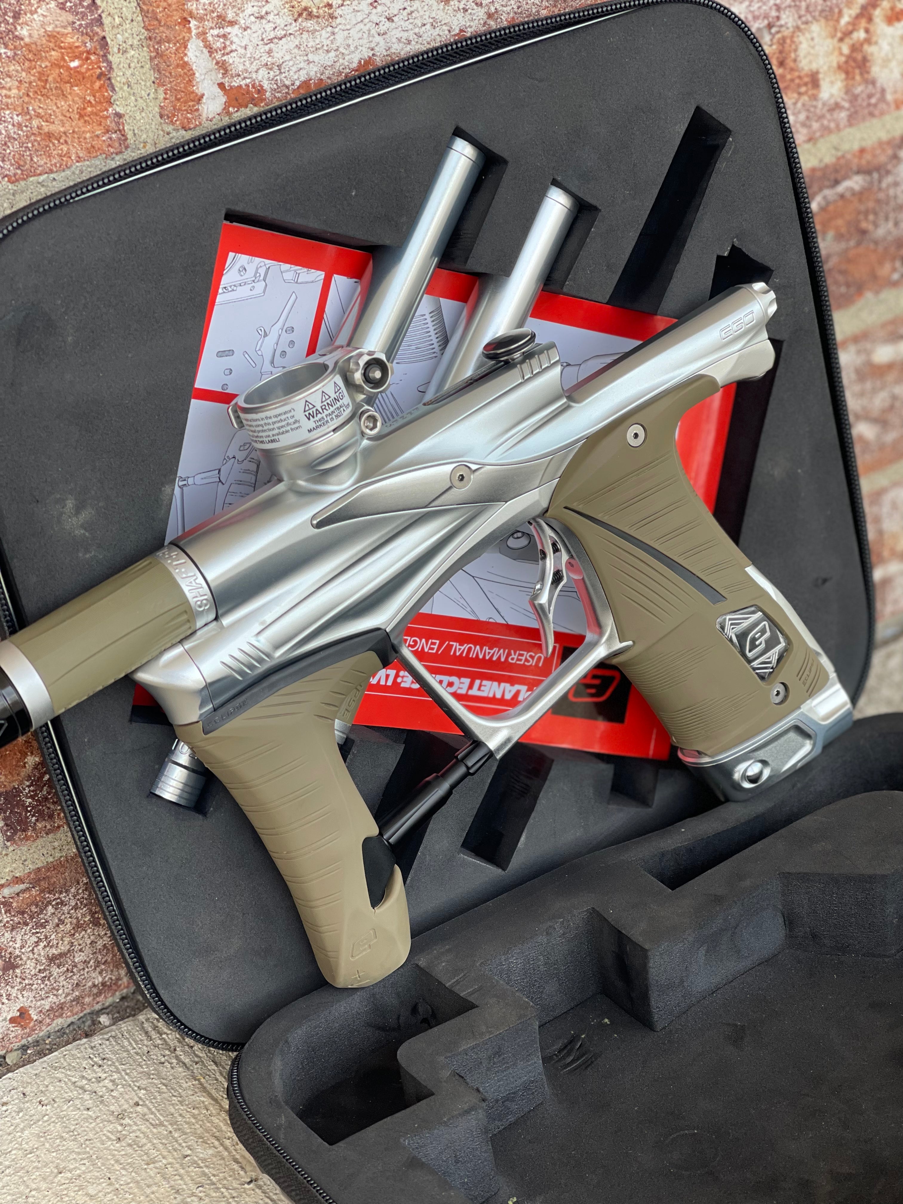 Used Planet Eclipse LV1.6 Paintball Gun - Silver (Pure) w/ Tan Grips, 3 FL Inserts, and Infamous Deuce Trigger