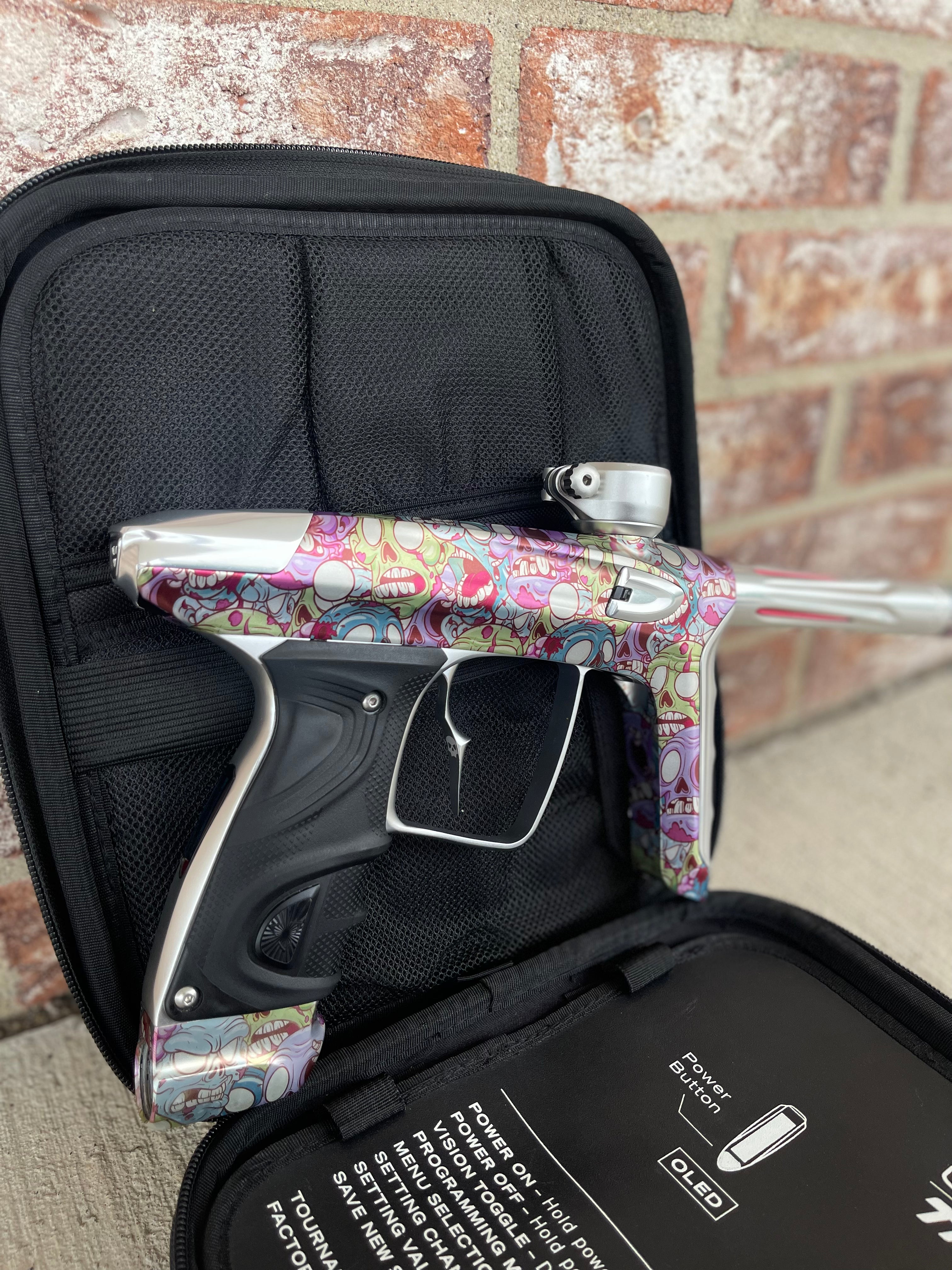 Used DLX Luxe TM40 Paintball Gun - LE Zombie Edition w/Silver Deuce Trigger & Wireless Charger