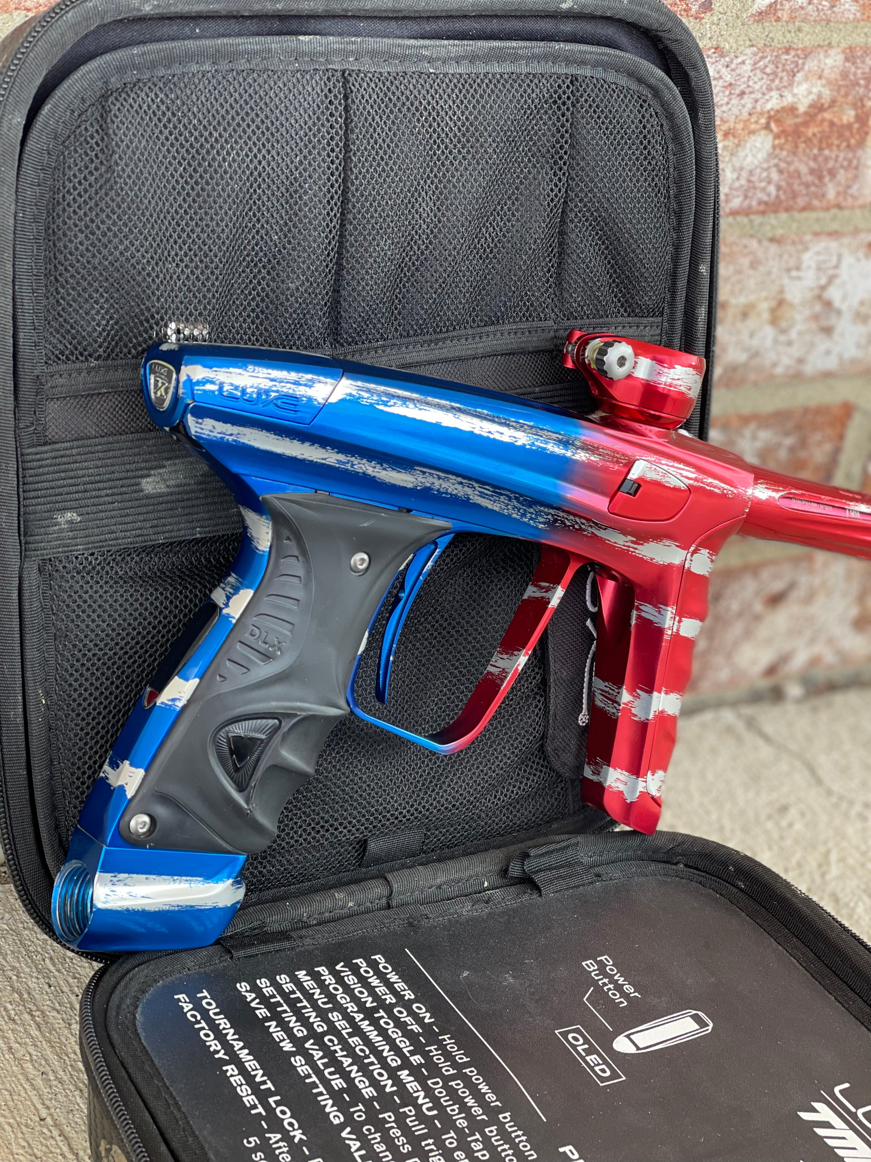 Used DLX Luxe X Paintball Gun - Gloss Patriot Splash