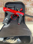 Used Dye DM15 Paintball Marker - Gloss Red w/ 2 UL Backs, Lockdown 2 Feedneck, SLAP ASA, Deuce Trigger