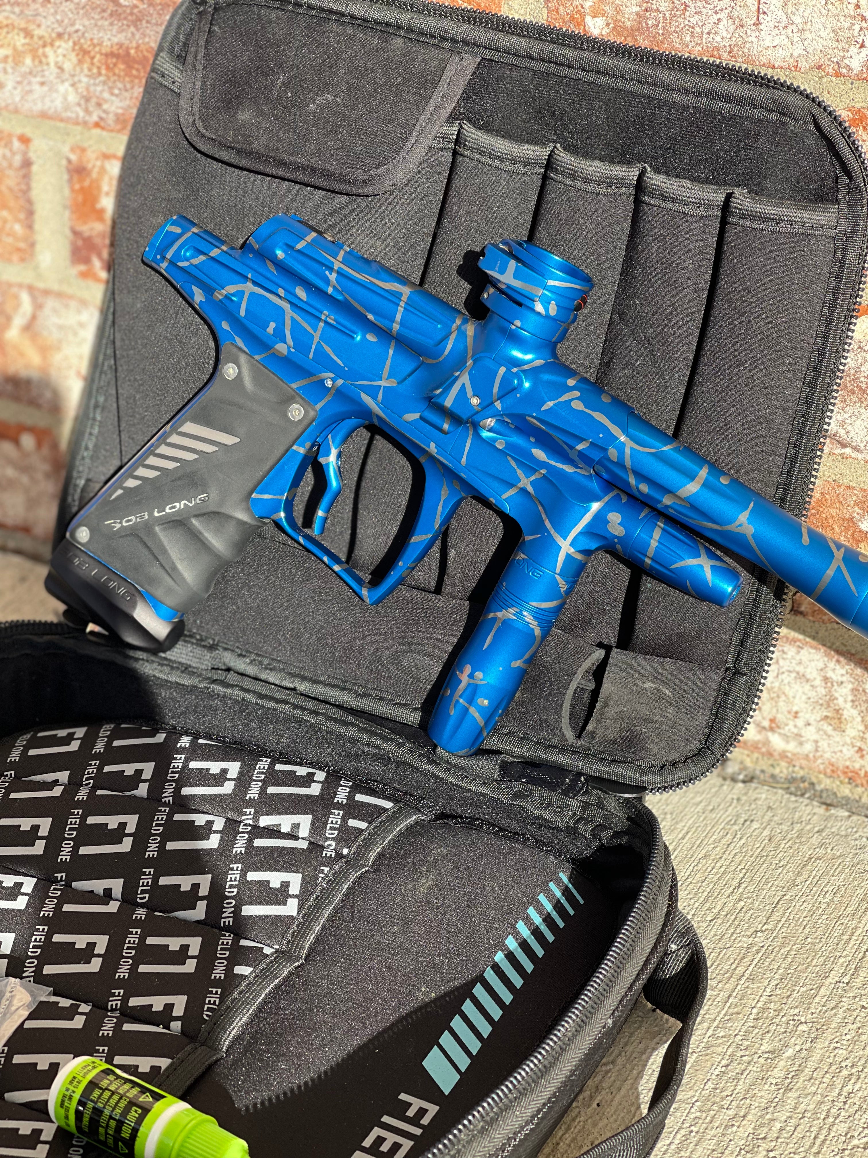 Used Bob Long G6R OLED Paintball Gun - Z Cut - Blue/Silver Splash