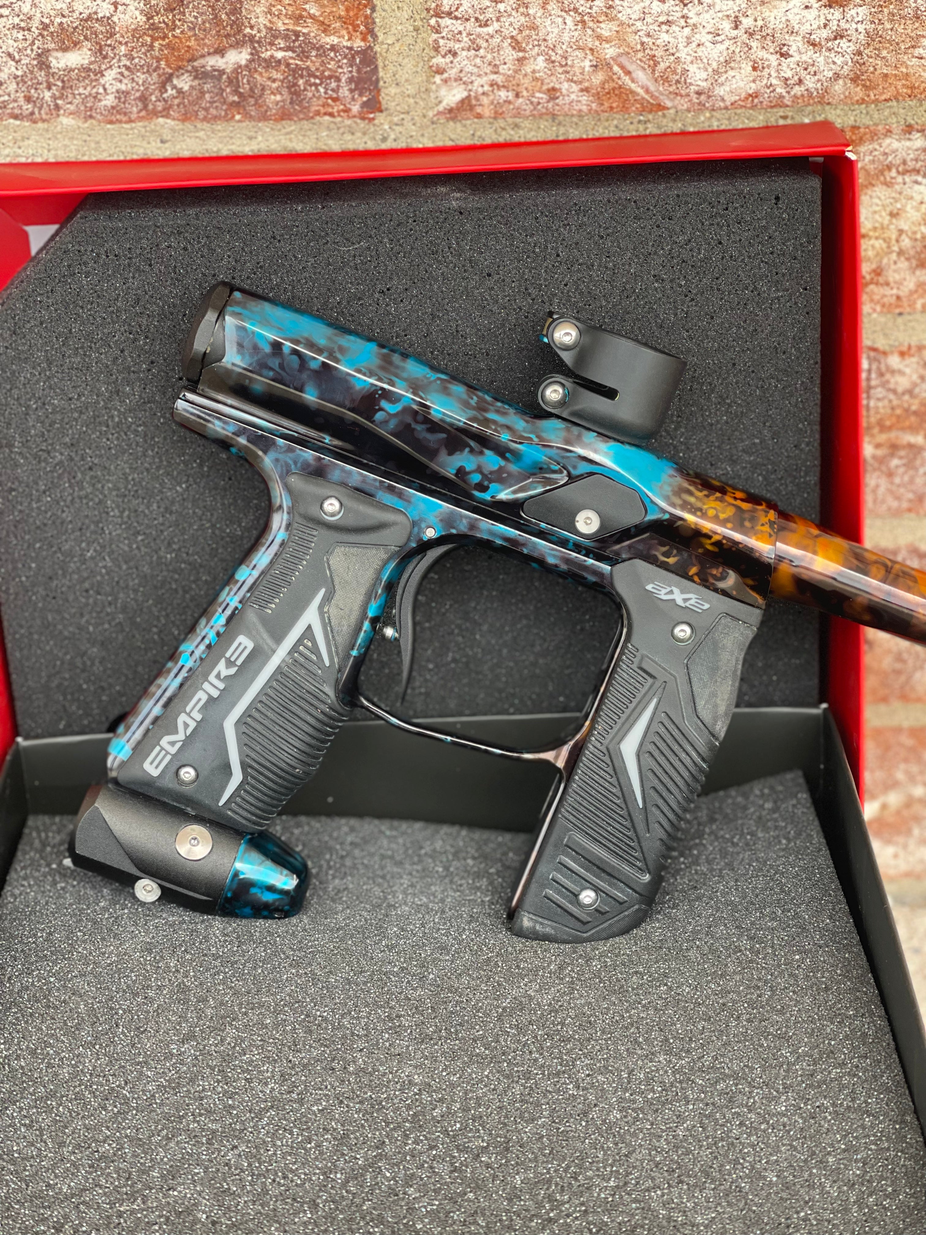 Used Empire Axe 2.0 Paintball Gun - Acid Wash Custom Anno (Orange Teal)