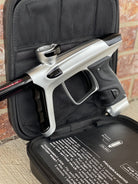 Used DLX Luxe TM40 Paintball Gun - Dust Silver/Gloss Black w/ Stock Bolt and SSC Bolt