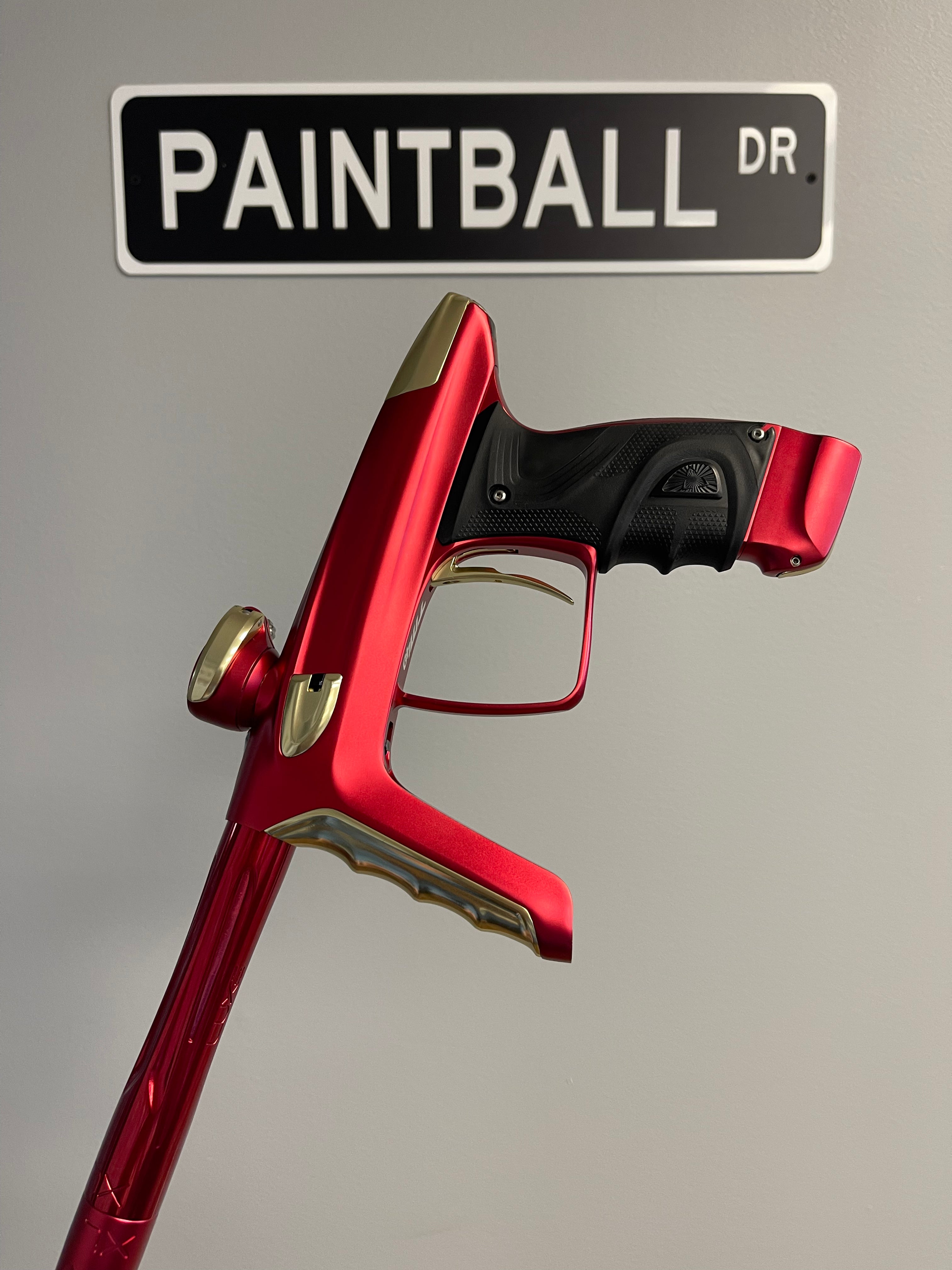 Used DLX Luxe TM40 Paintball Gun - Dust Red / Gloss Gold
