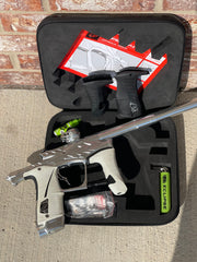 Used Planet Eclipse/HK Army Fossil LV1.6 XV Paintball Gun - Pure (Silver) w/ White and Black Grips, Infamous Silencio Barrel Tip, and Infamous Deuce Trigger