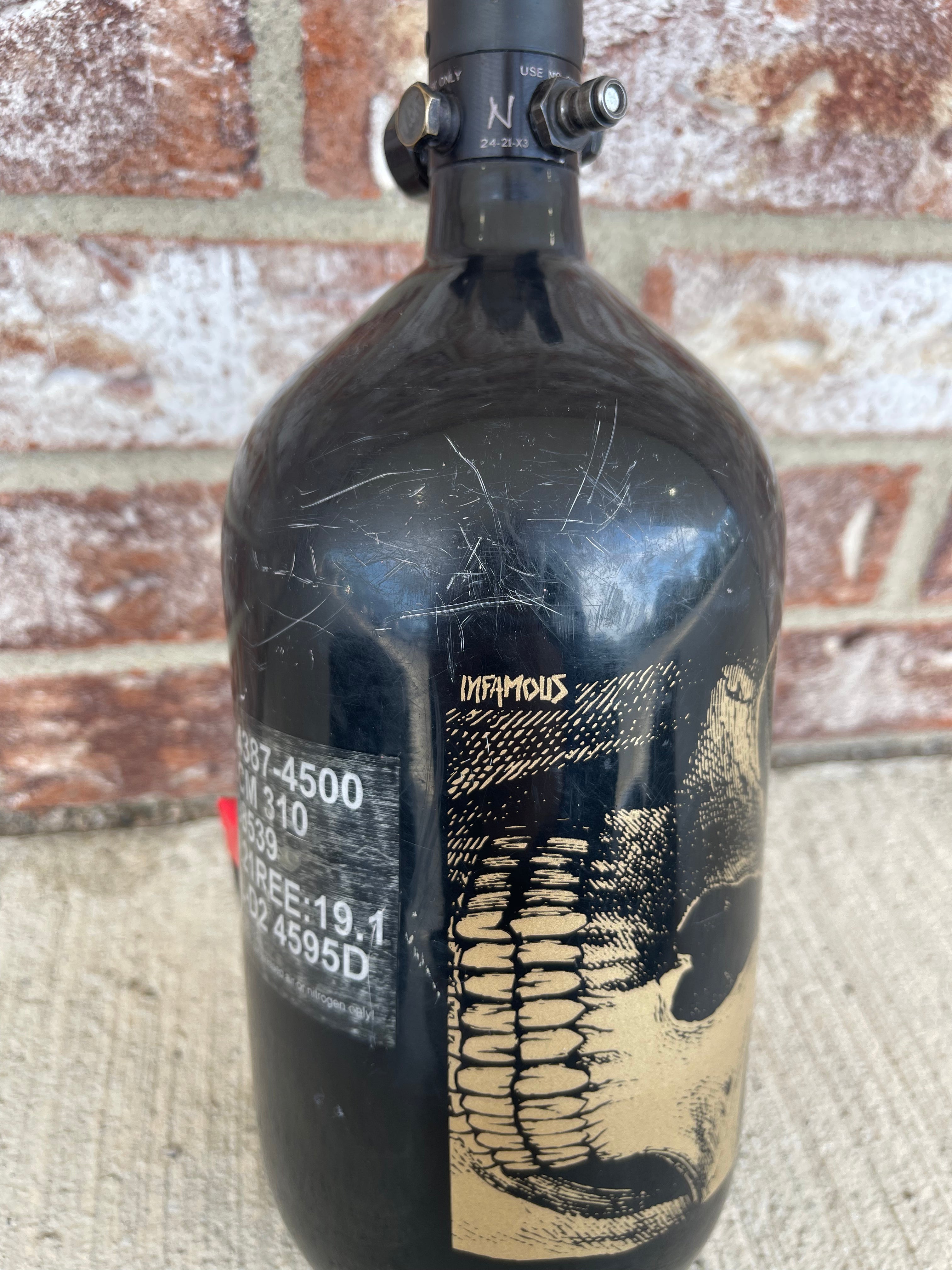 Used Infamous 80/4500 Skeleton Air Paintball Tank - Black / Gold w/ Ninja Standard Regulator