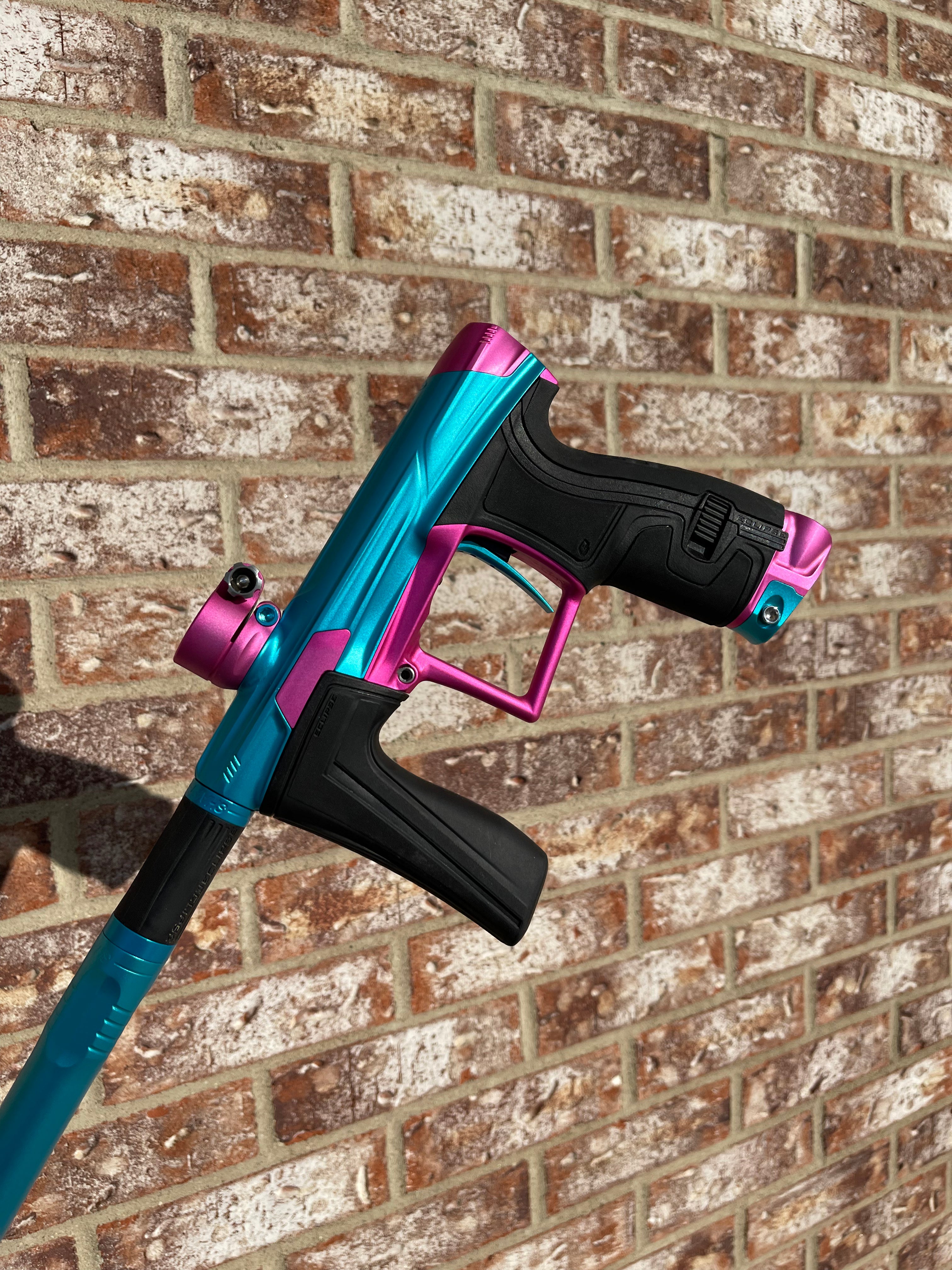 Used Planet Eclipse Geo 4 Paintball Gun - Teal/Pink