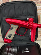 Used DLX Luxe TM40 Paintball Gun - Dust Red / Gloss Red w/ 2 back grips and SSC Soft Tip Bolt