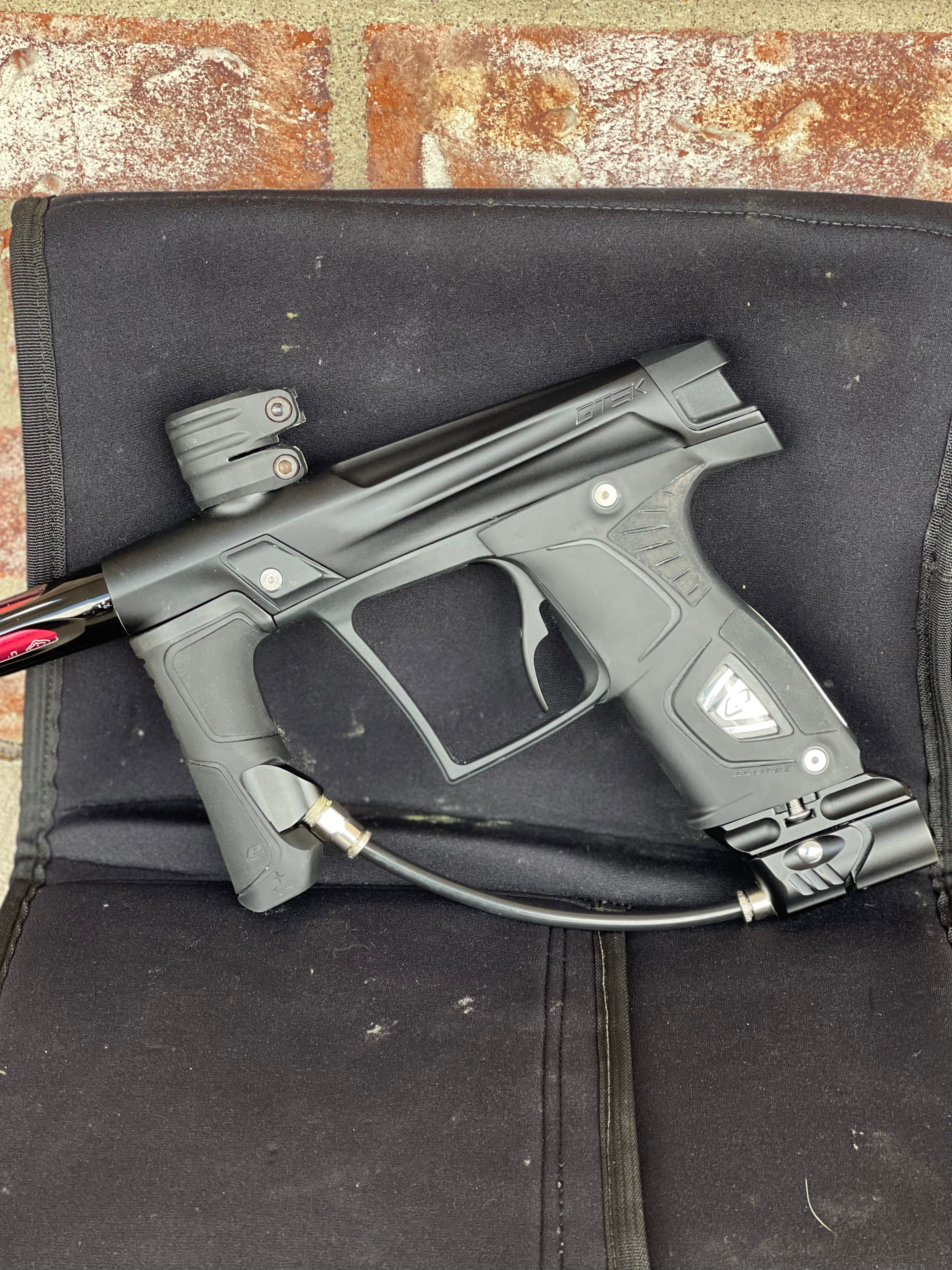 Used Planet Eclipse Gtek OLED Paintball Marker- Black with Gmek Frame, Deadlywinds 14" Carbon Fiber Tip, POPS ASA w/Dropdown Rail