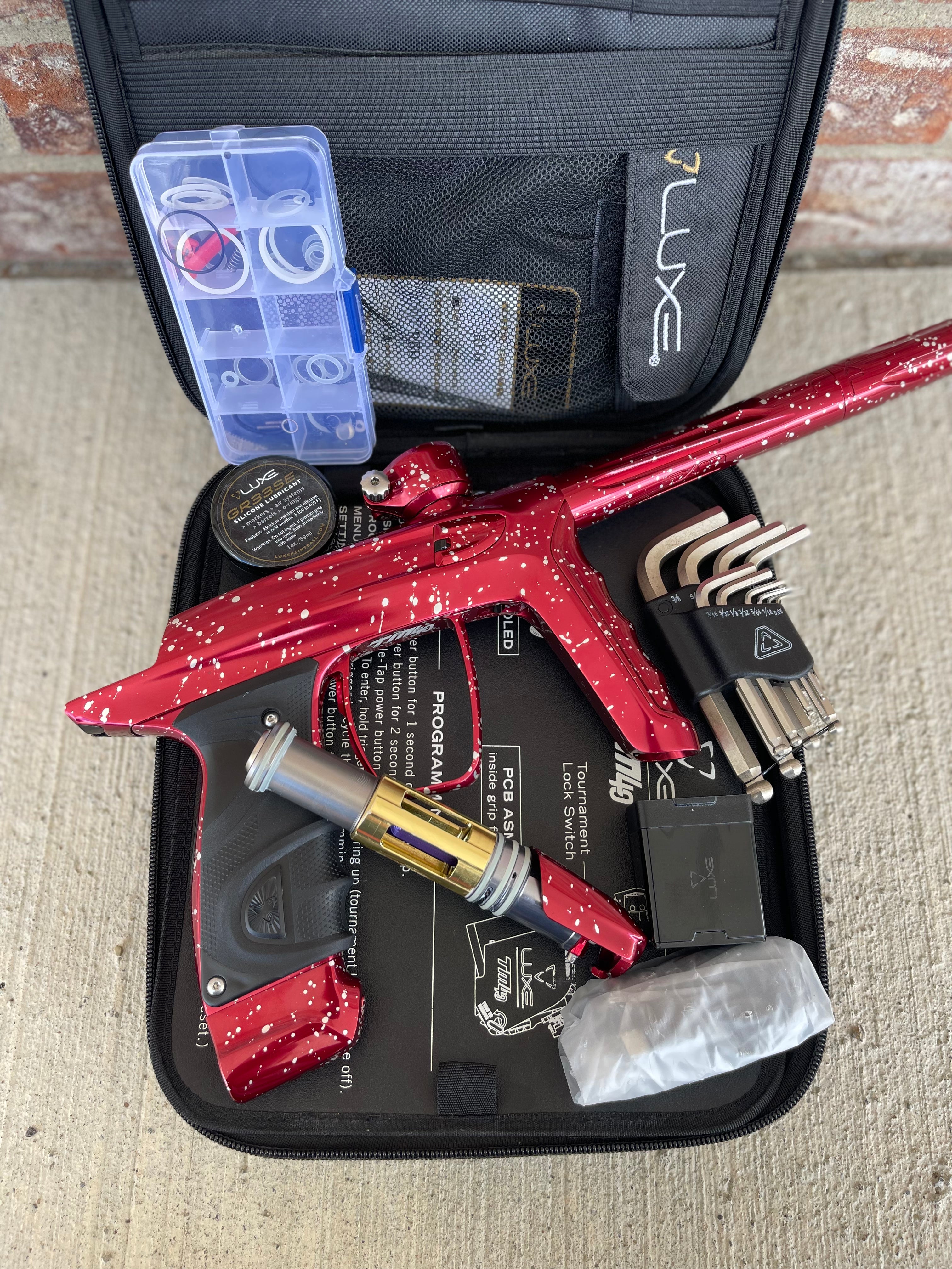 Used DLX Luxe TM40 Paintball Gun - LE Polished Red with White Speckling