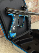 Used Shocker XLS Paintball Gun - Black with Blue Green Splash Trigger Frame and CVO Frame