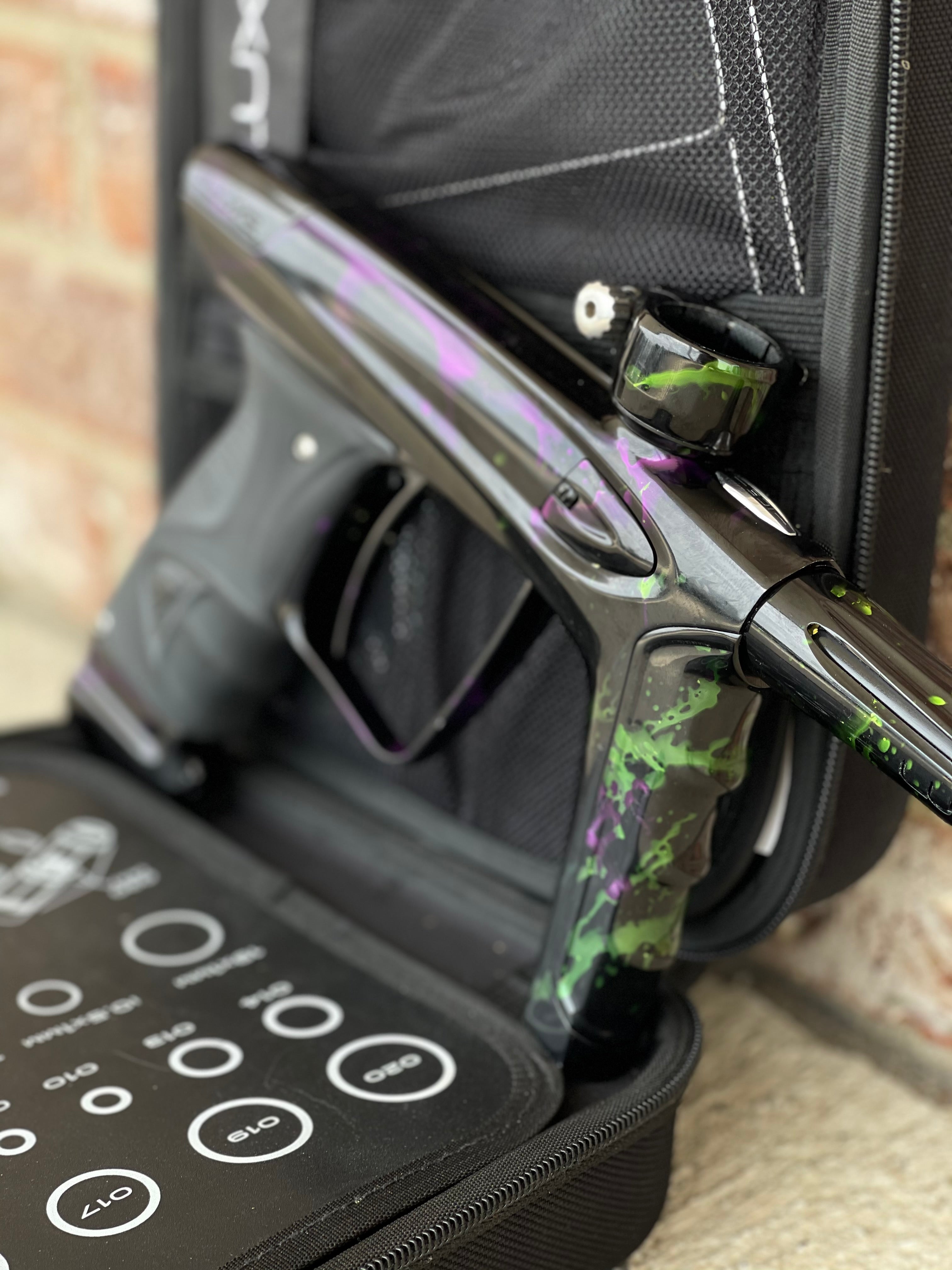 Used DLX Luxe Ice Paintball Gun - Acid Wash Green / Purple