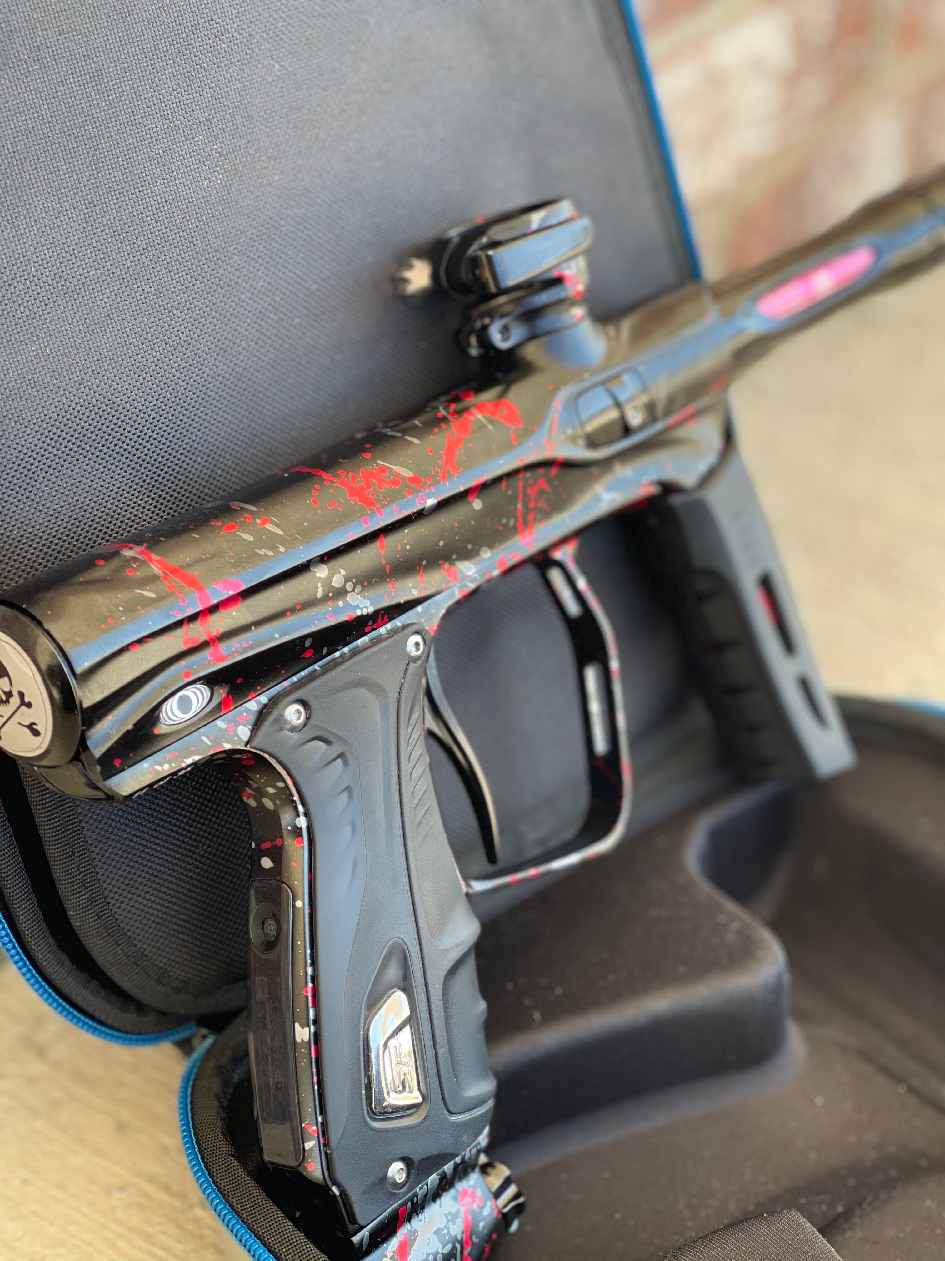 Used SP Shocker XLS Paintball Gun - LE Punisher's Tri Color Splash