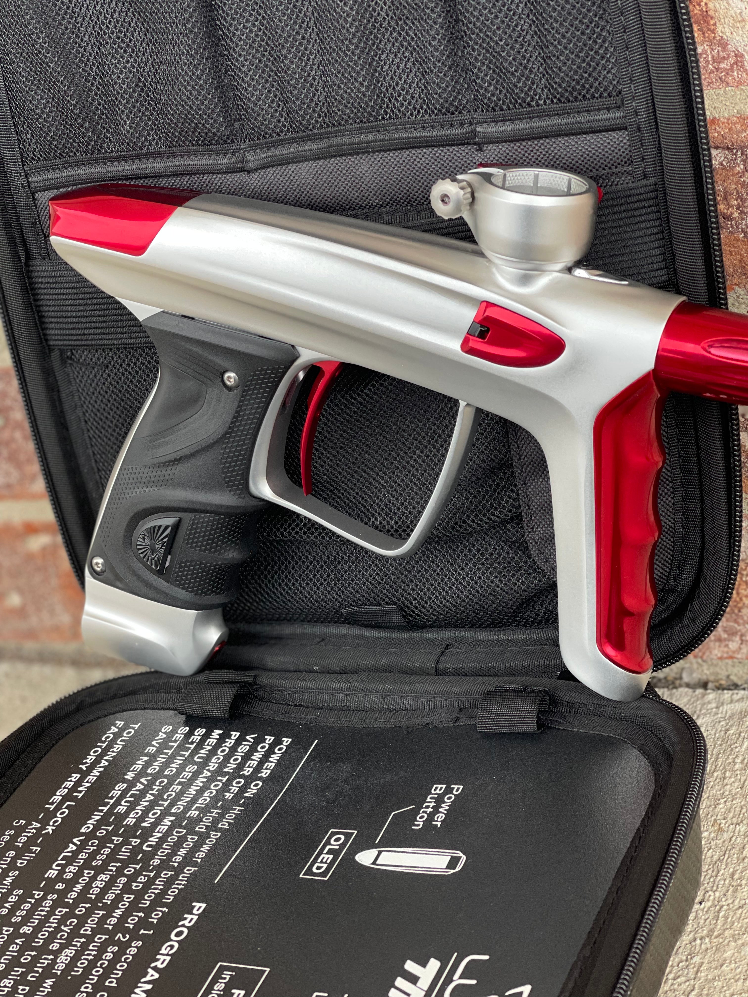 Used DLX Luxe TM40 Paintball Gun - Dust White / Polished Red