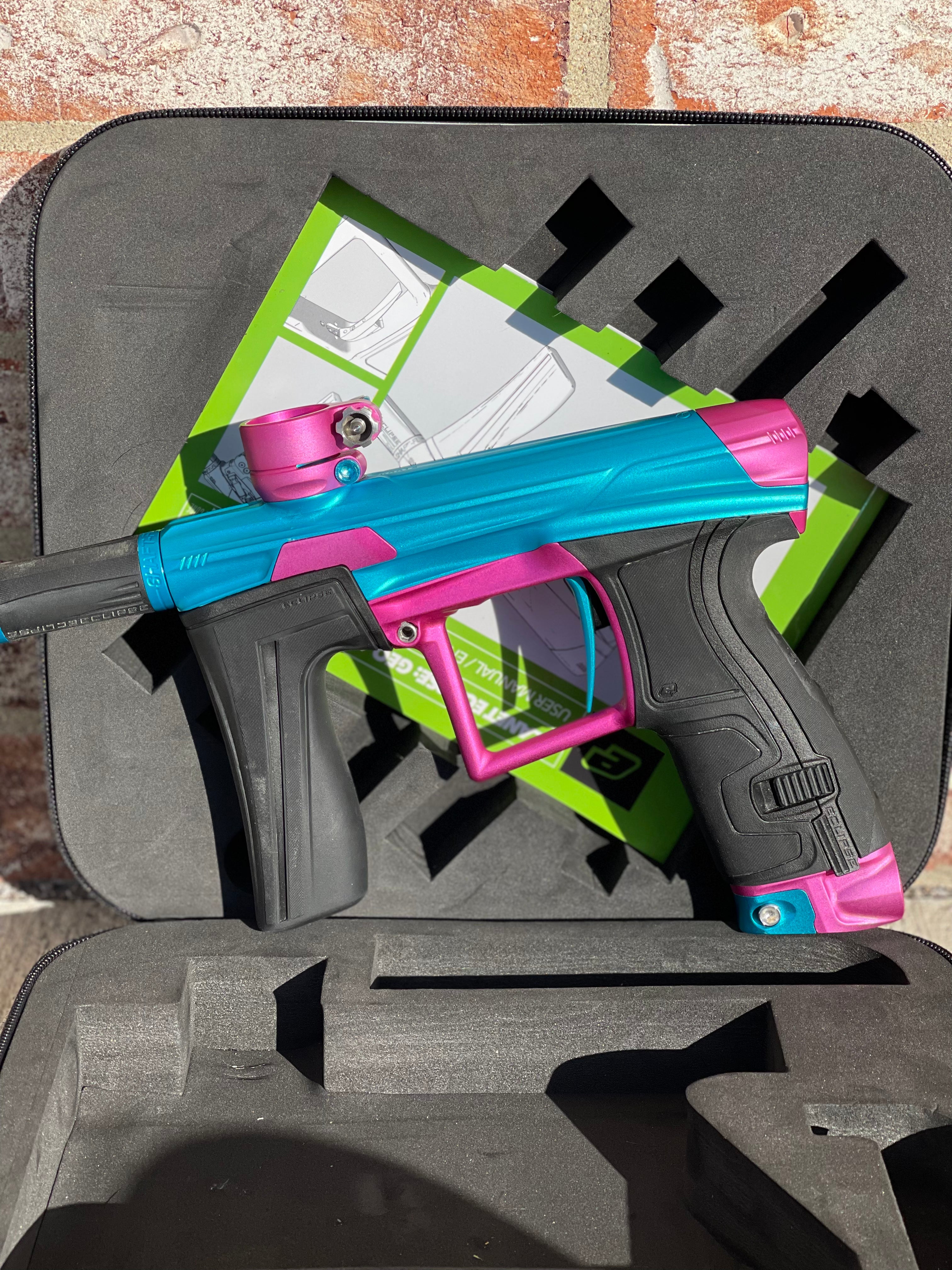 Used Planet Eclipse Geo 4 Paintball Gun - Teal/Pink