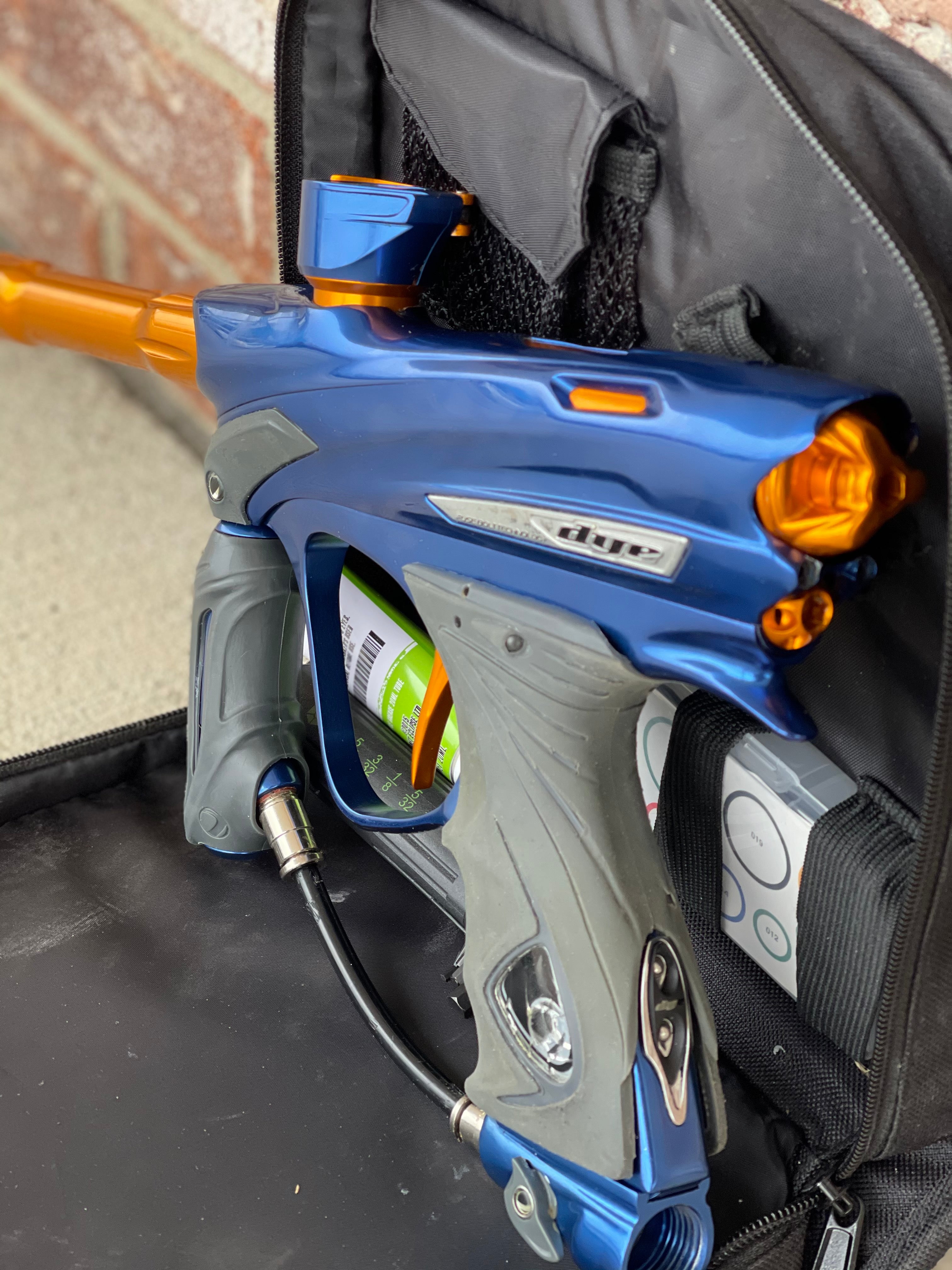 Used Dye DM13 Paintball Marker - Blue / Orange