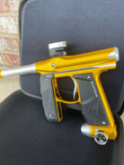 Used Empire Mini GS Paintball Gun w/ 2 Piece Barrel - Dust Gold / Silver w/ HK Army Exo 2.0 Marker Case