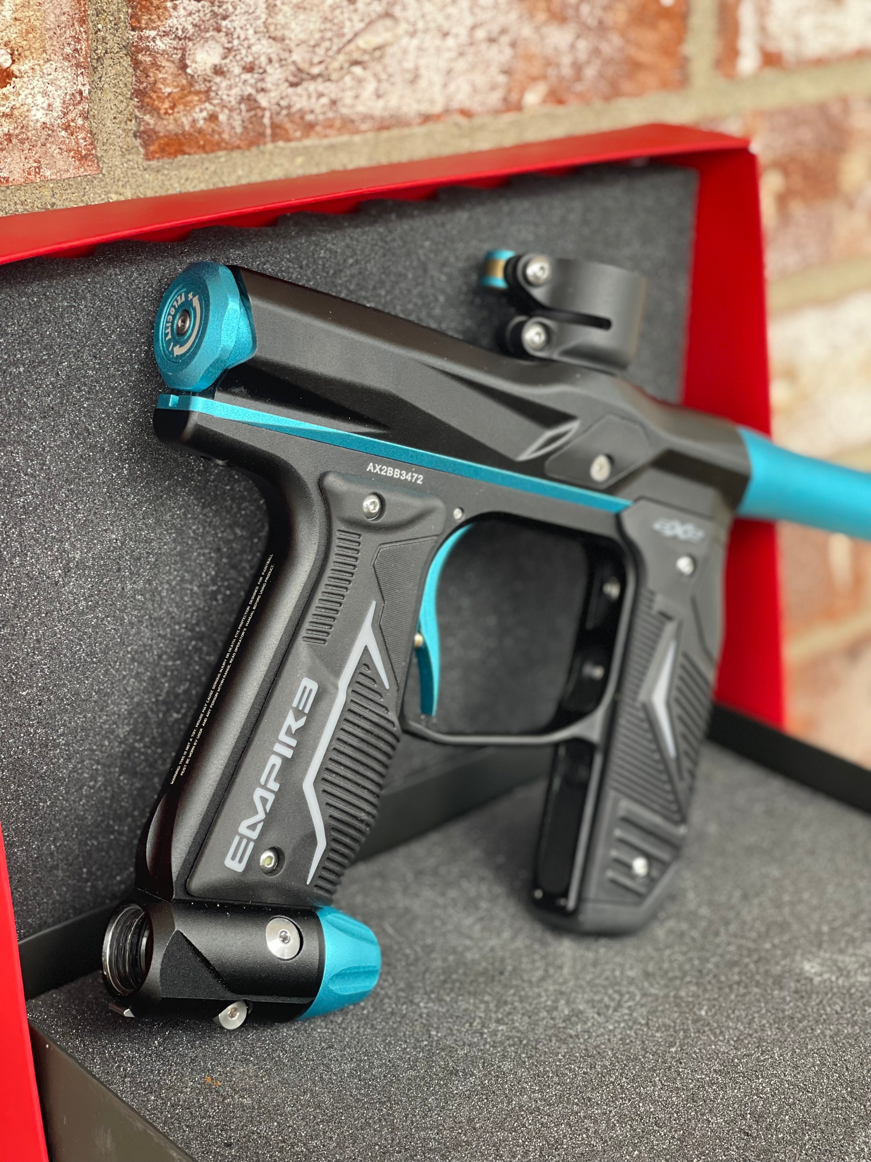 Used Empire Axe 2.0 Paintball Gun - Black w/Teal Accents