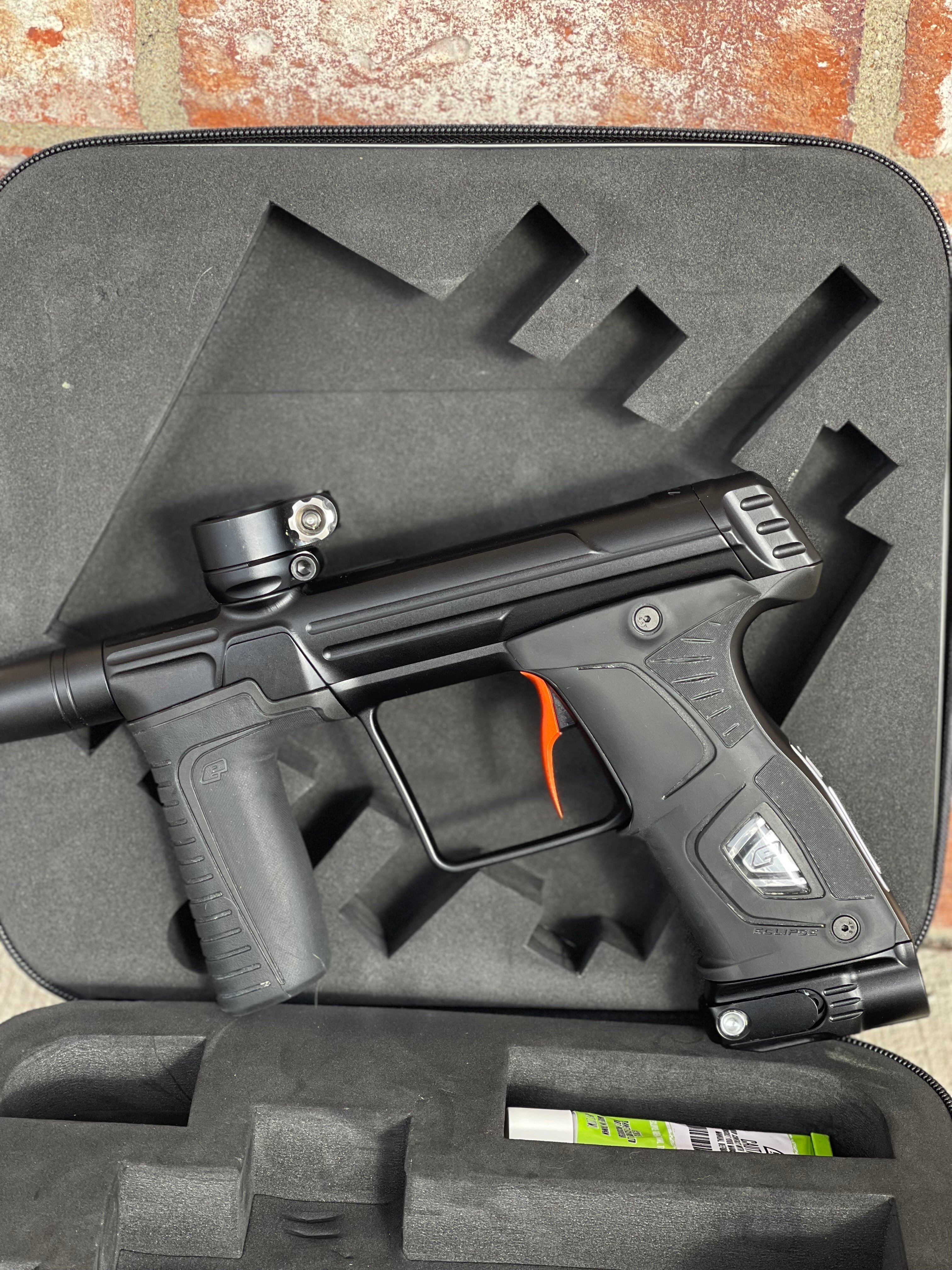 Used Planet Eclipse Gtek 170R Paintball Gun - Black w/ Orange Scythe Trigger