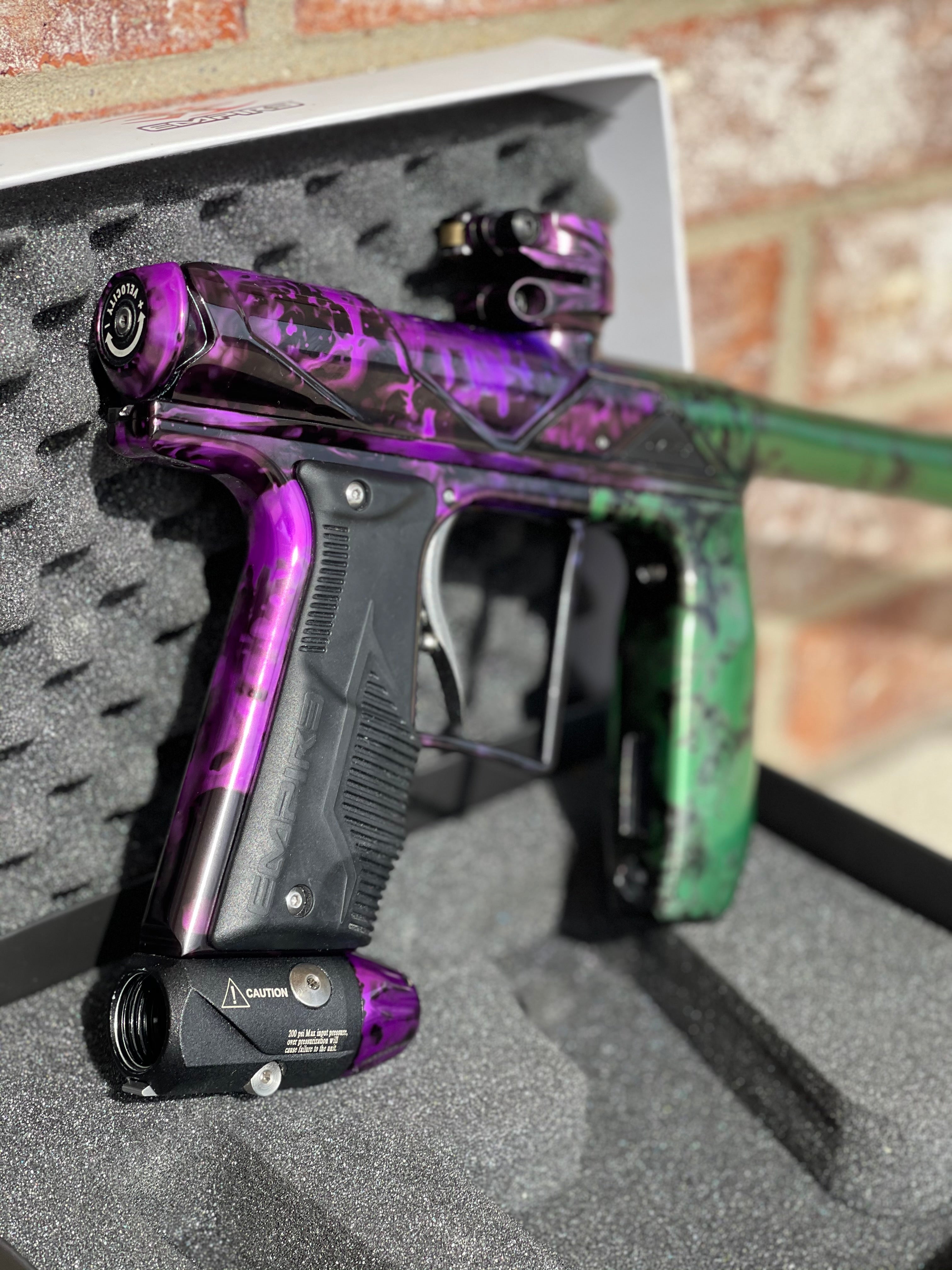Used Empire Axe Pro Paintball Gun - Acid Wash Pruple / Green