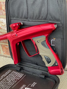 Used DLX Luxe TM40 Paintball Gun - Dust Red / Gloss Red w/ 2 back grips and SSC Soft Tip Bolt