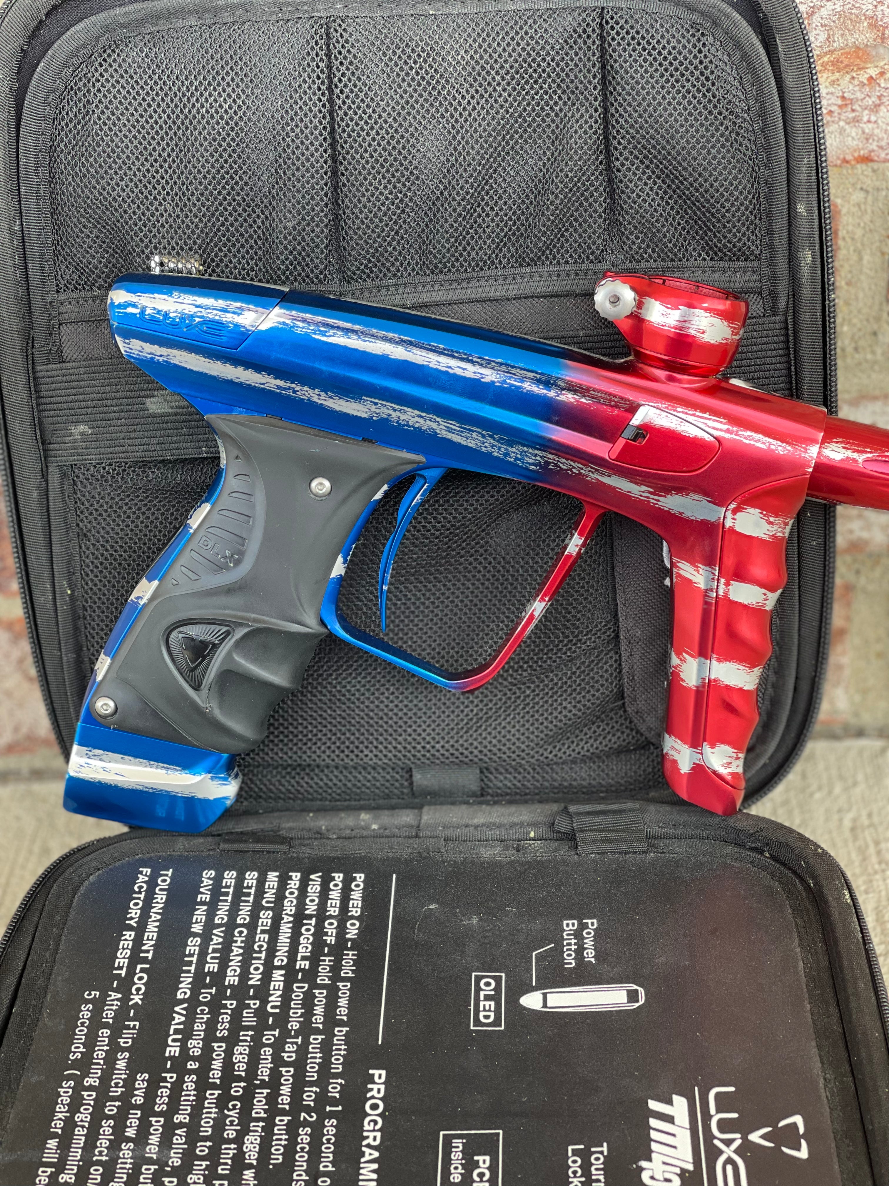 Used DLX Luxe X Paintball Gun - Gloss Patriot Splash