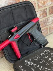 Used DLX Luxe Ice Paintball Gun - Dust Black / Dust Red w/ Infamous Deuce Trigger and 3 Freak Inserts