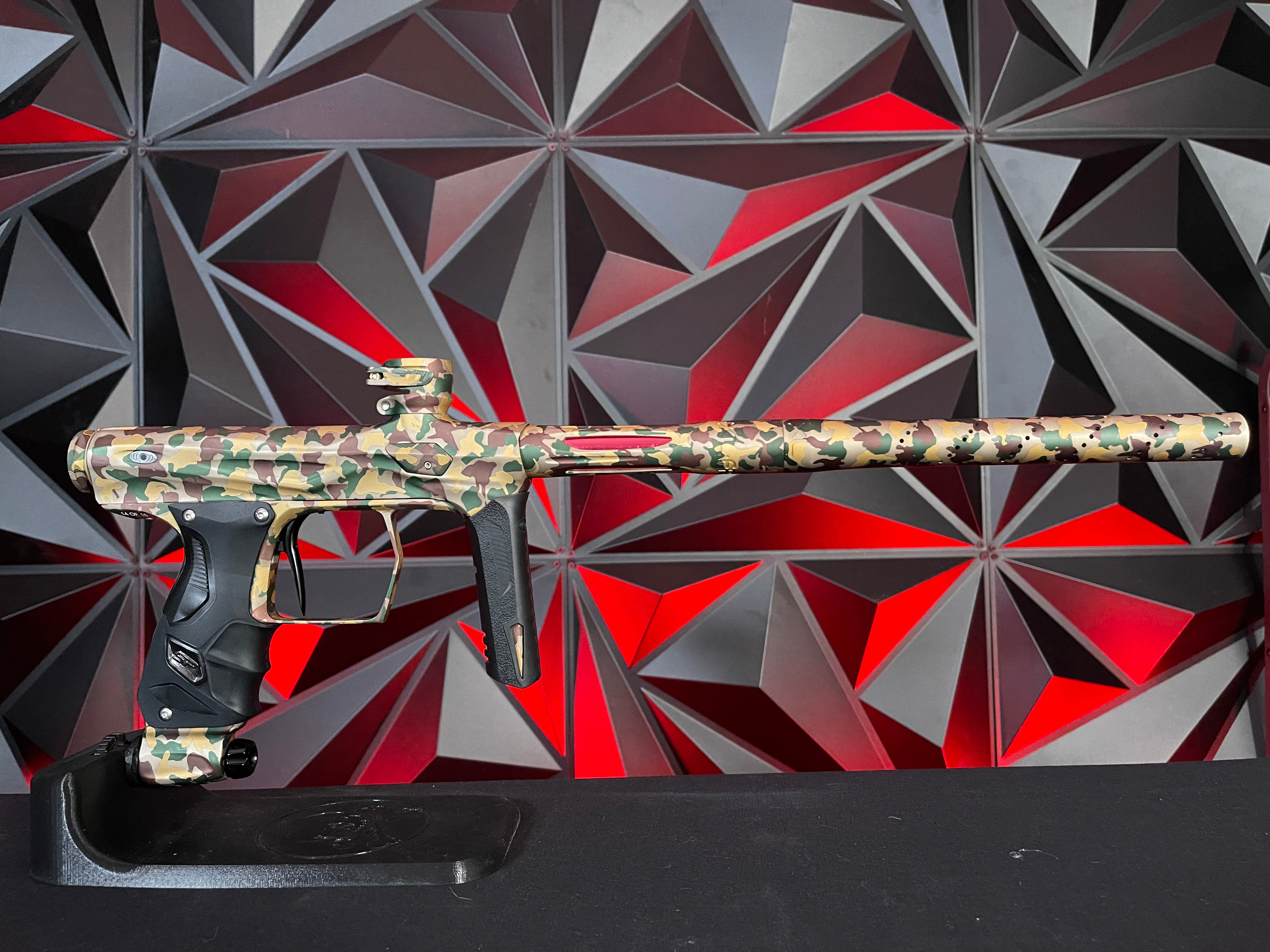 Used SP Shocker Amp Paintball Gun - LE Woodland Camo #14 w/SSC Bolt Tip