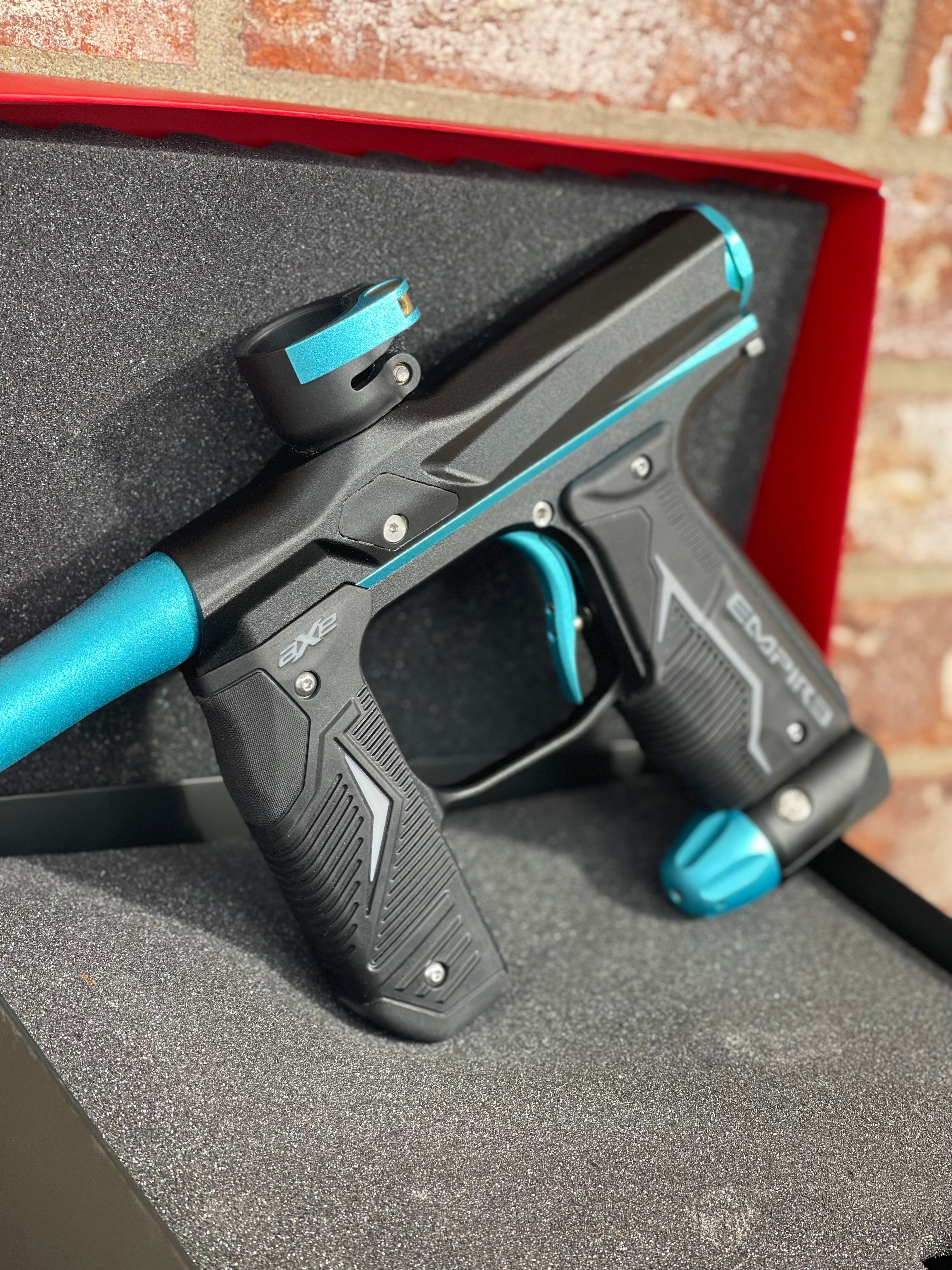Used Empire Axe 2.0 Paintball Gun - Black w/Teal Accents