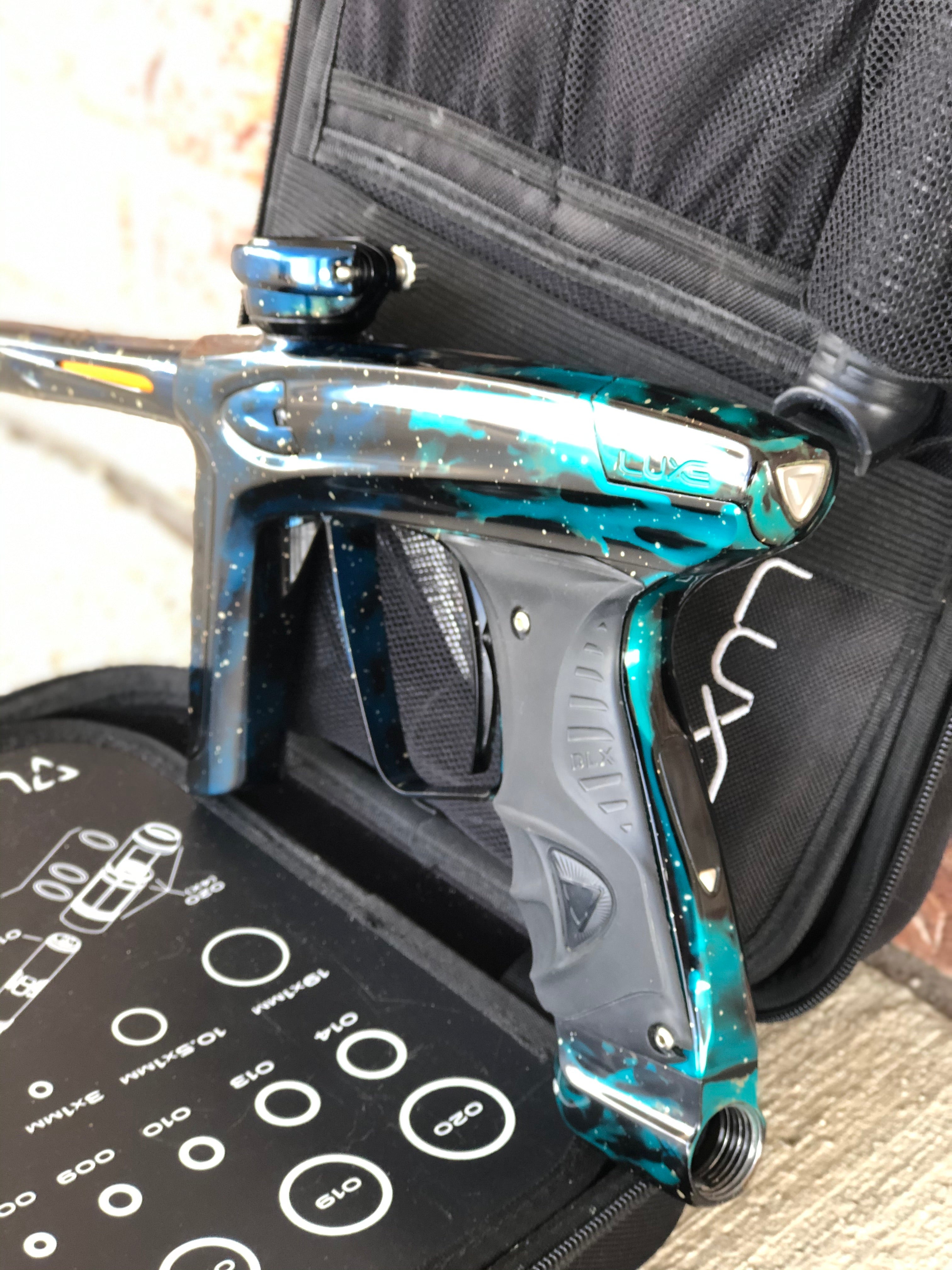 Used DLX Luxe Ice Paintball Gun - Galaxy Teal/Black/Blue