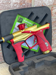 Used Planet Eclipse Lv1.6 Paintball Gun - Fire Opal w/Red Infamous Deuce Trigger and 2 grips